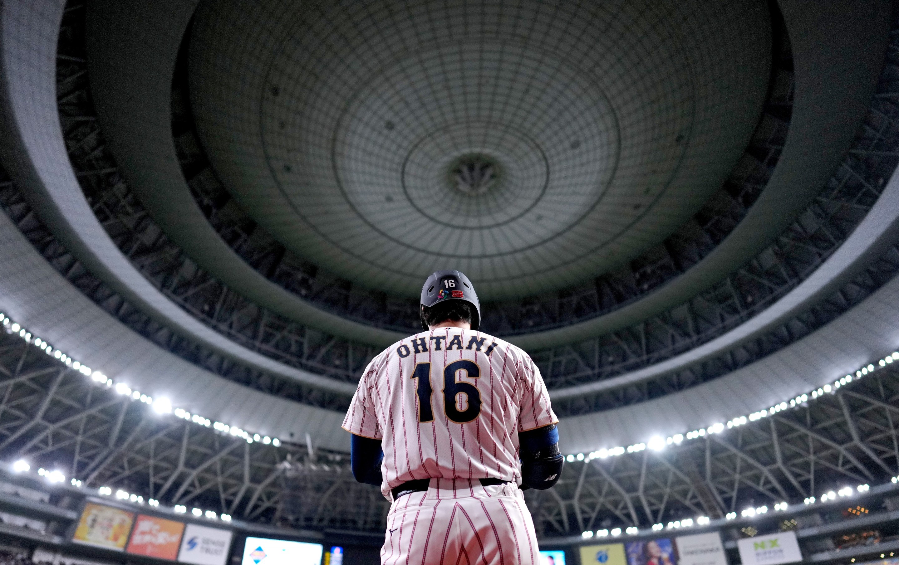 Shohei Ohtani #16 of team Japan warms up during the 2026 World Baseball Classic exhibition game.