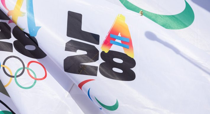 One of the variations of the 2028 Olympic logo was displayed on Thursday, May 8, 2025. The Los Angeles Memorial Coliseum and SoFi Stadium will share the opening ceremony.