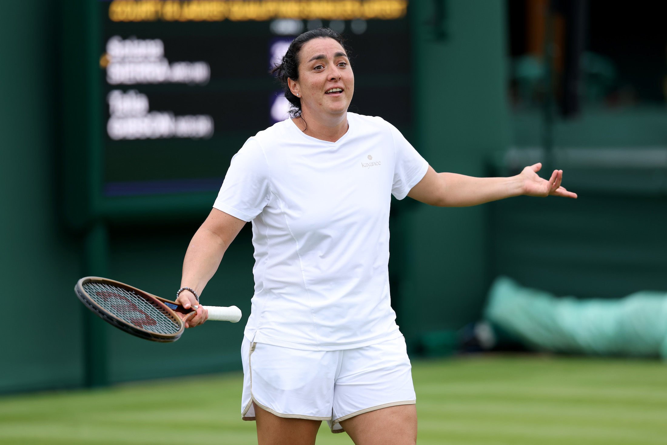 Ons Jabeur of Tunisia reacts to Paula Badosa of Spain during practice prior to The Championships Wimbledon 2025 at All England Lawn Tennis and Croquet Club on June 26, 2025 in London, England. (Photo by Clive Brunskill/Getty Images)