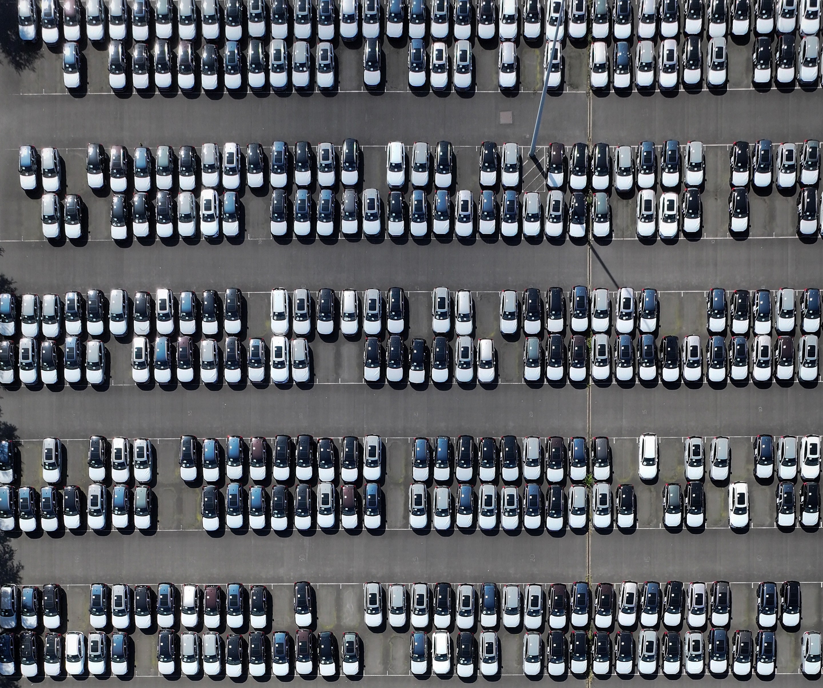 GRIMSBY, ENGLAND - JUNE 28: An aerial view of imported new cars on the quayside of Alexandra Dock at Grimsby Port on June 28, 2025 in Grimsby, England. (Photo by Christopher Furlong/Getty Images)