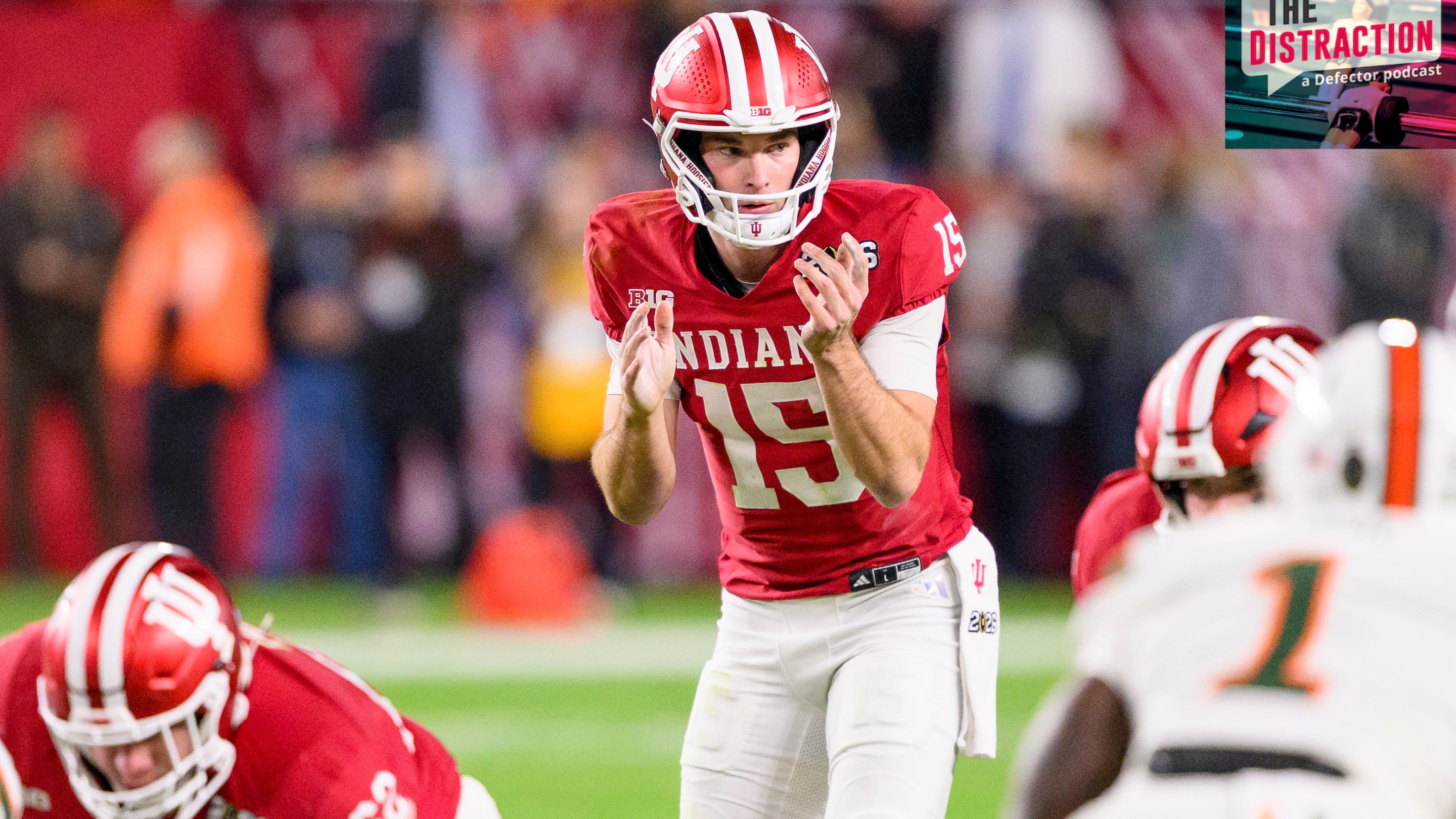 Fernando Mendoza of the Indiana Hoosiers prepares to take the snap of the ball at the line of scrimmage during the Indiana Hoosiers versus the Miami Hurricanes College Football Playoff National Championship Game.