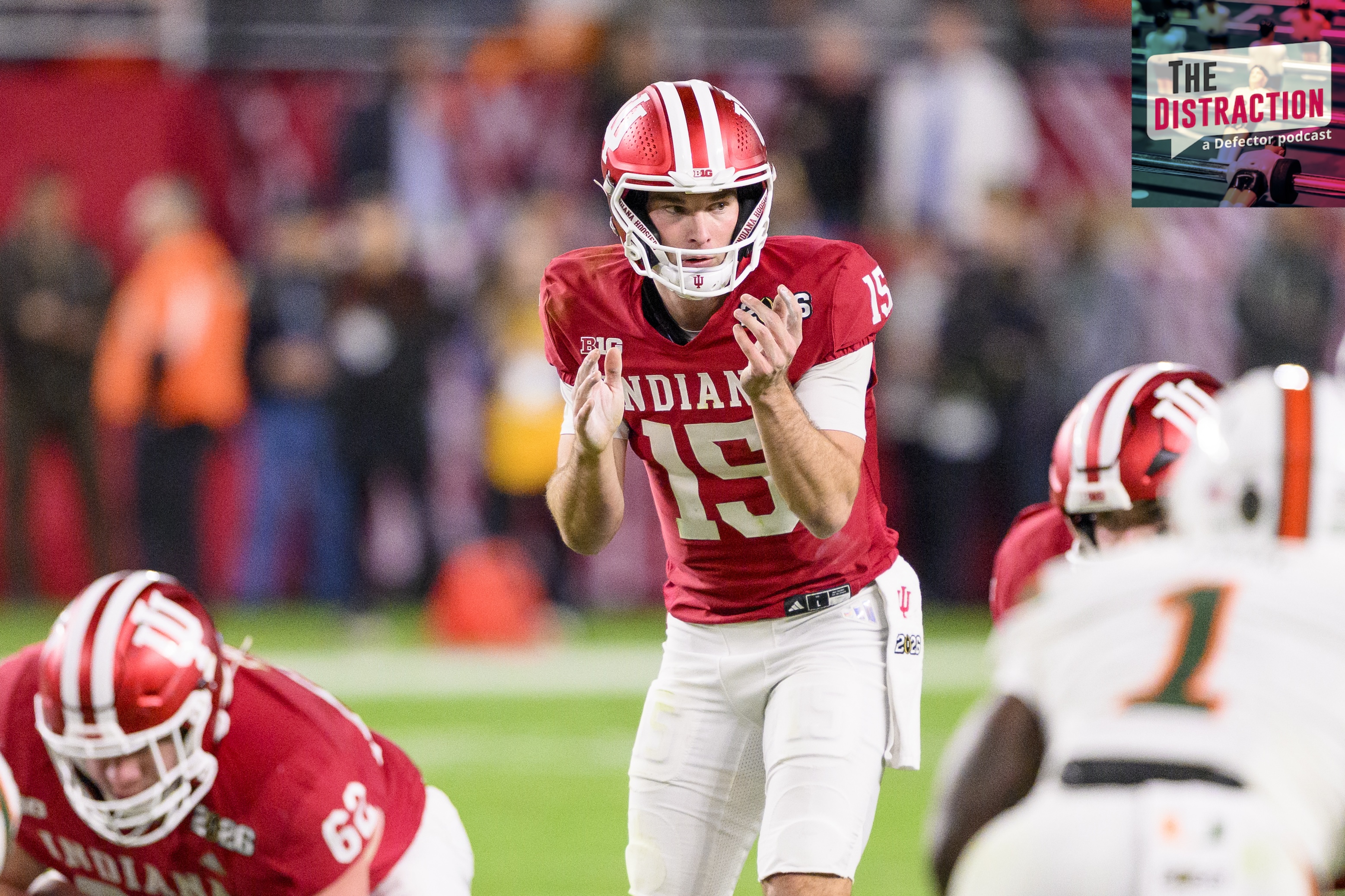 Fernando Mendoza of the Indiana Hoosiers prepares to take the snap of the ball at the line of scrimmage during the Indiana Hoosiers versus the Miami Hurricanes College Football Playoff National Championship Game.