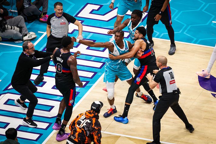 Moussa Diabate #14 of the Charlotte Hornets and Jalen Duren #0 of the Detroit Pistons fight