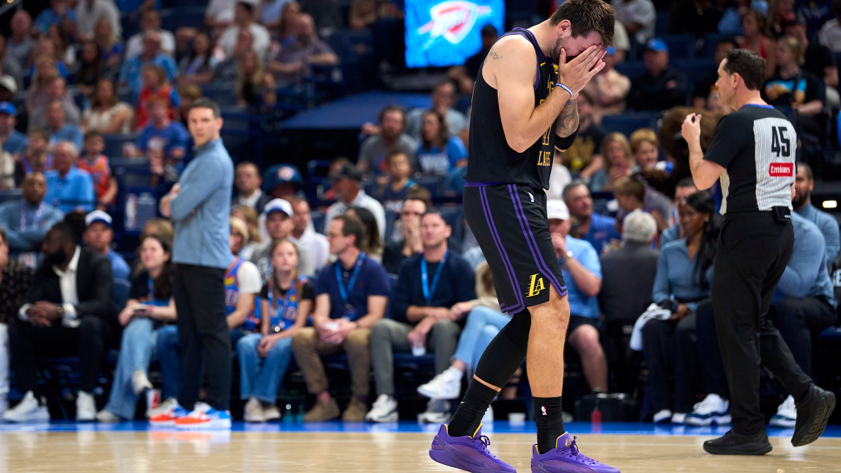 Luka Doncic of the Los Angeles Lakers reacts after a play during the second half against the Oklahoma City Thunder at the Paycom Center on April 2, 2026 in Oklahoma City. This is the play in which he hurt his hamstring.
