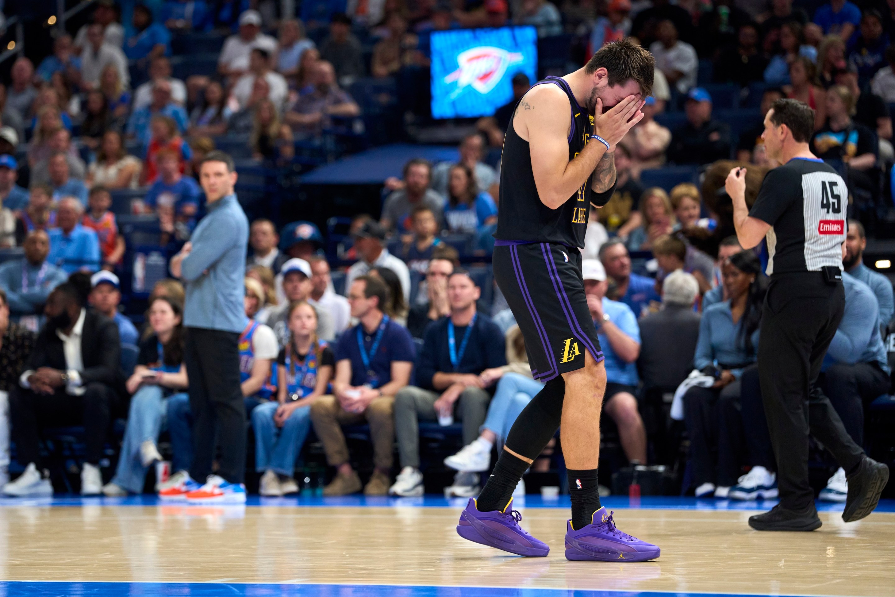 Luka Doncic of the Los Angeles Lakers reacts after a play during the second half against the Oklahoma City Thunder at the Paycom Center on April 2, 2026 in Oklahoma City. This is the play in which he hurt his hamstring.