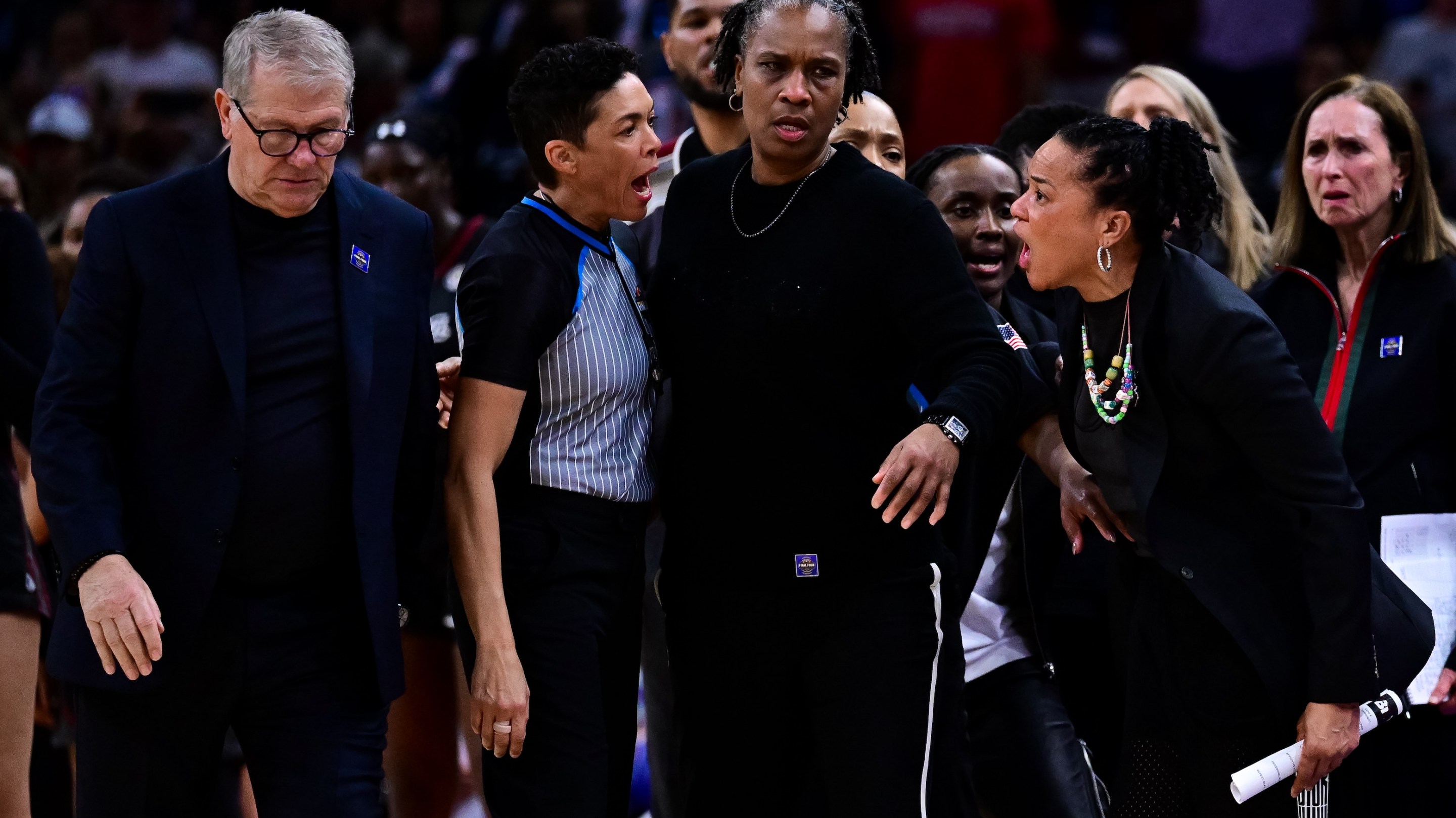 Dawn Staley of the South Carolina Gamecocks argues with Geno Auriemma of the UConn Huskies during the second half of a NCAA Women's Final Four semifinal game on April 3, 2026.