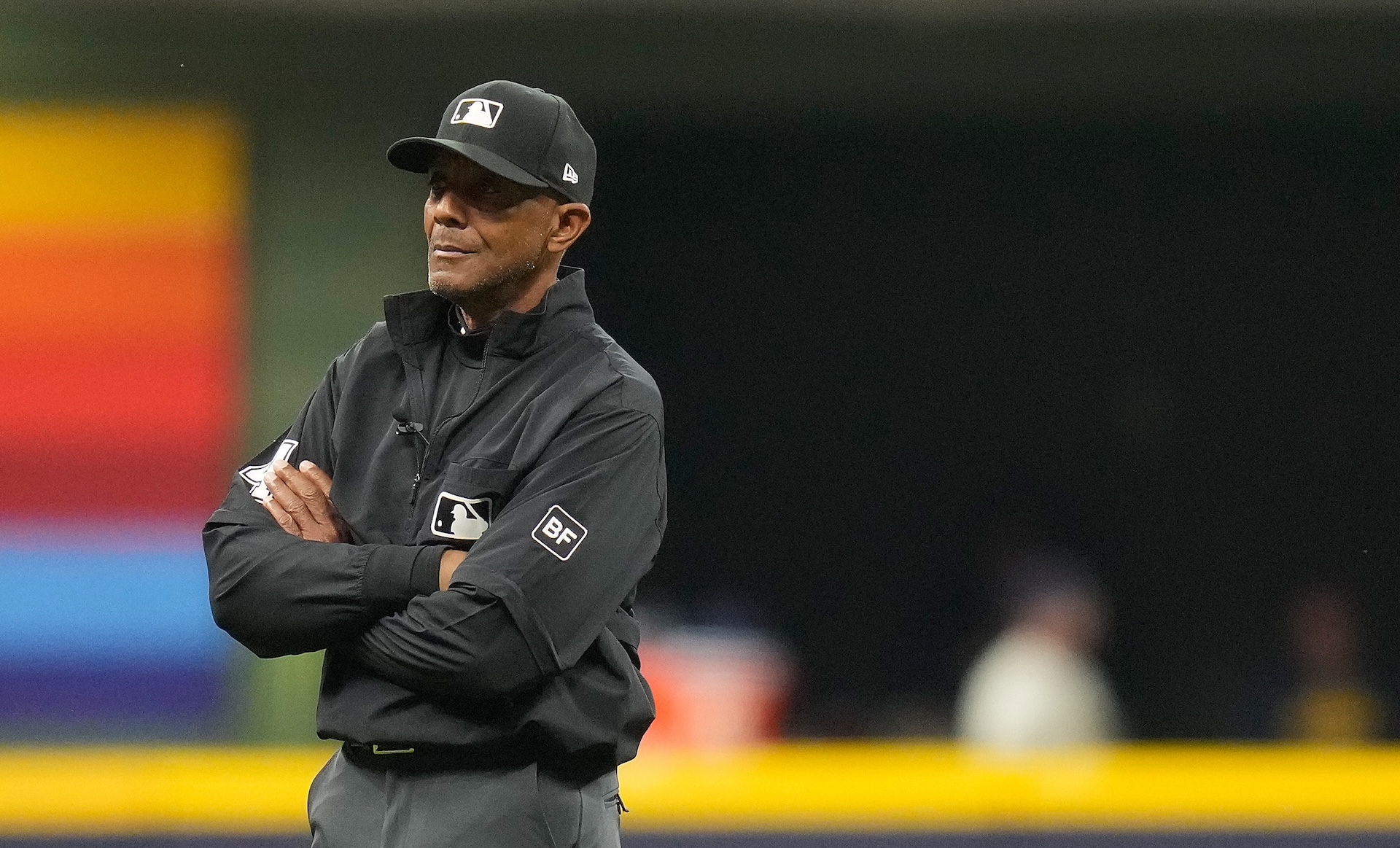 C.B. Bucknor stands with his arms crossed