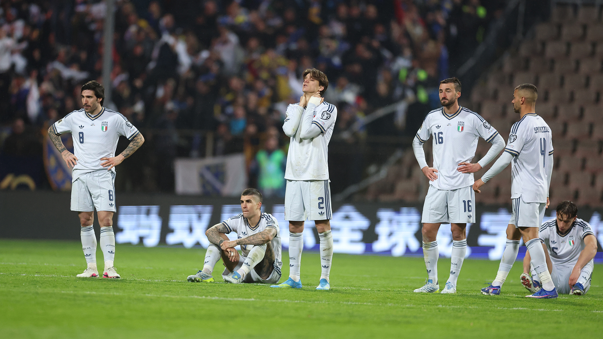 Players of Italy reacts at the end of the FIFA World Cup 2026 European Qualifiers KO play-offs match between Bosnia & Herzegovina and Italy at Stadion Bilino Polje on March 31, 2026 in Zenica, Bosnia and Herzegovina.