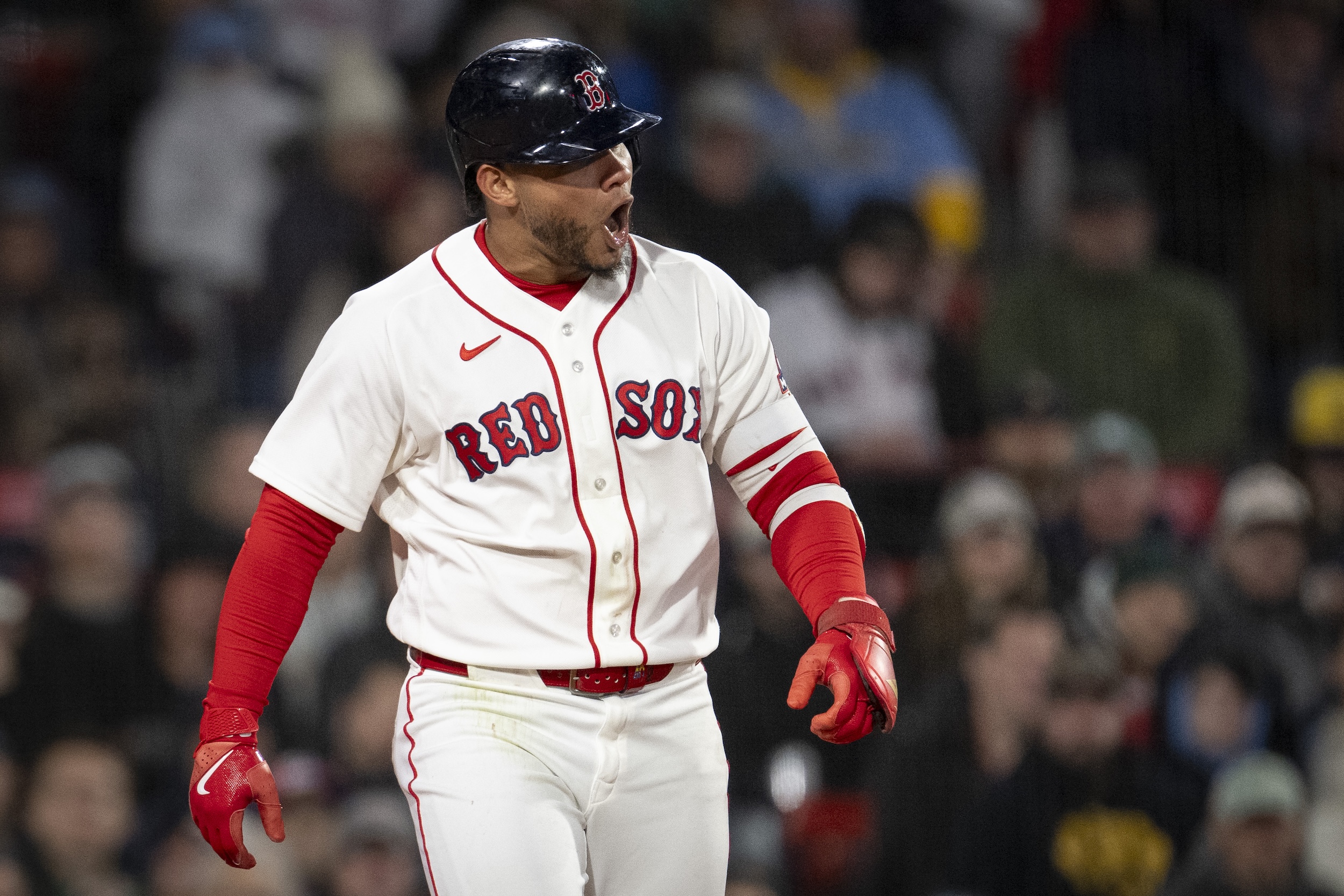 Willson Contreras reacts angrily to being hit by a pitch.
