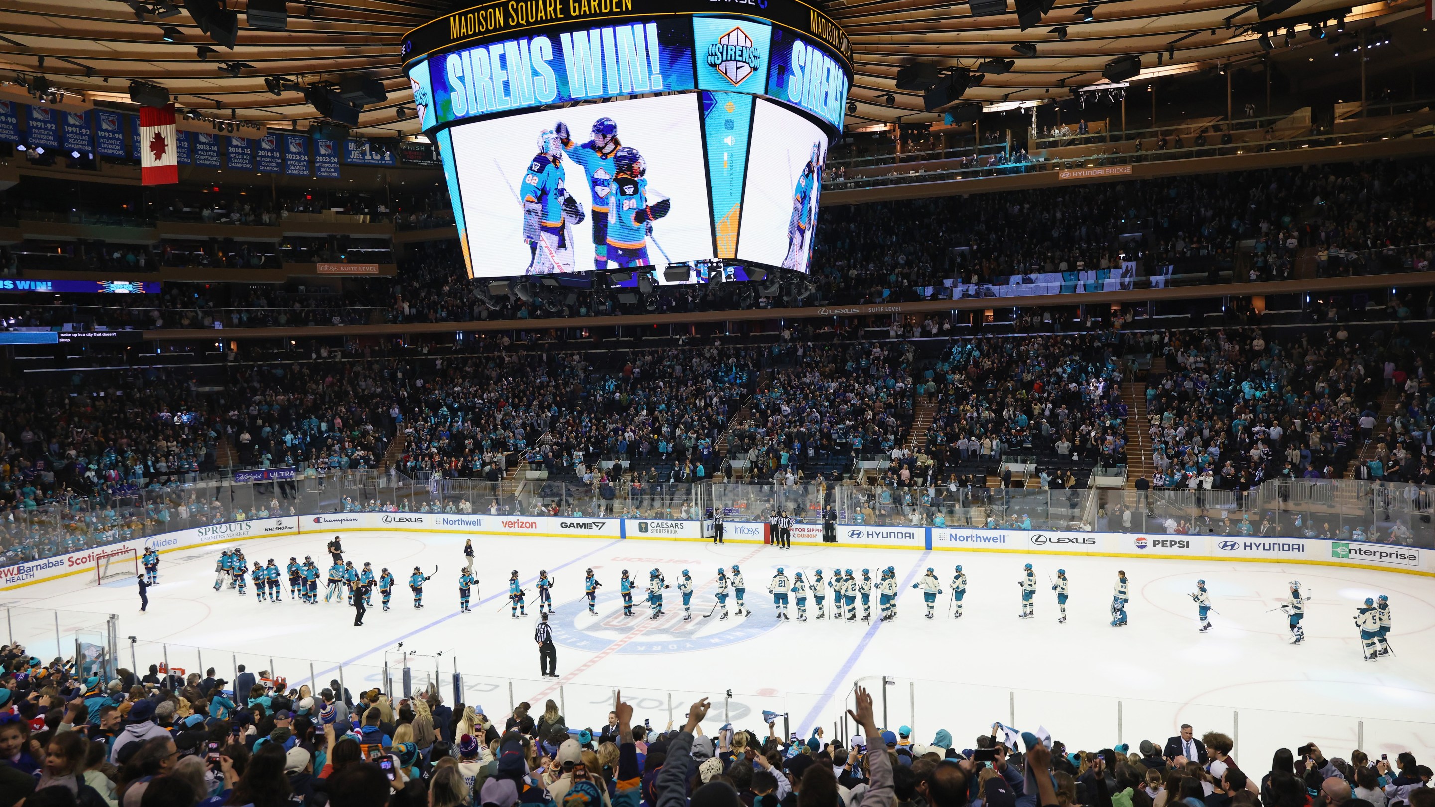 The New York Sirens and the Seattle Torrent shake hands following their game at Madison Square Garden