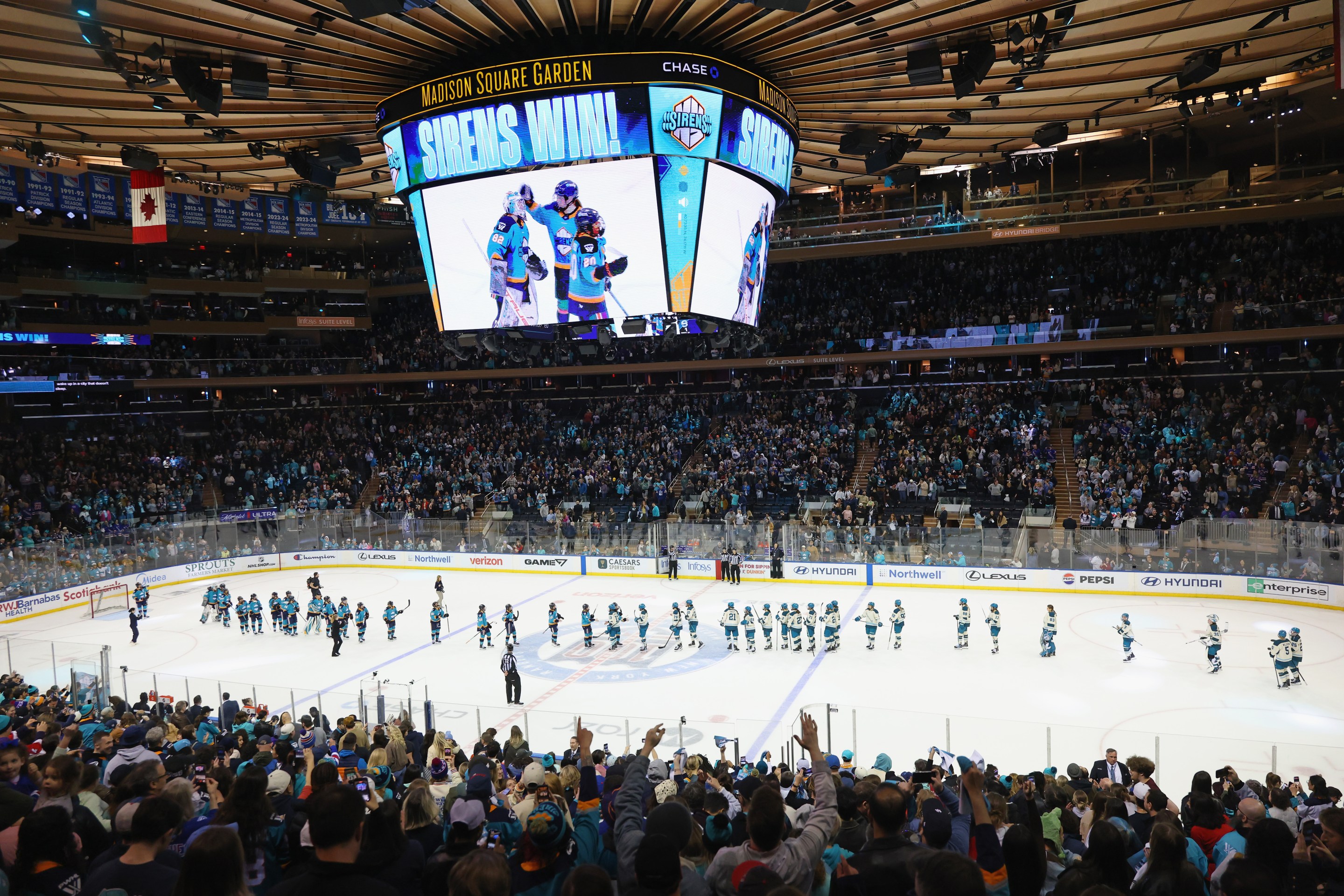 The New York Sirens and the Seattle Torrent shake hands following their game at Madison Square Garden