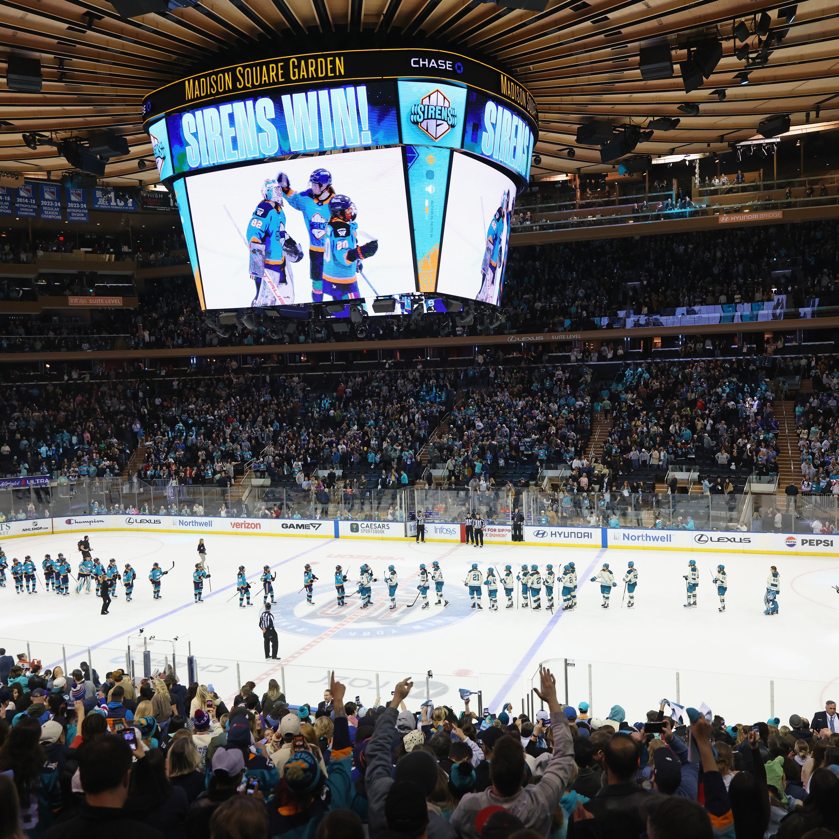 The New York Sirens and the Seattle Torrent shake hands following their game at Madison Square Garden