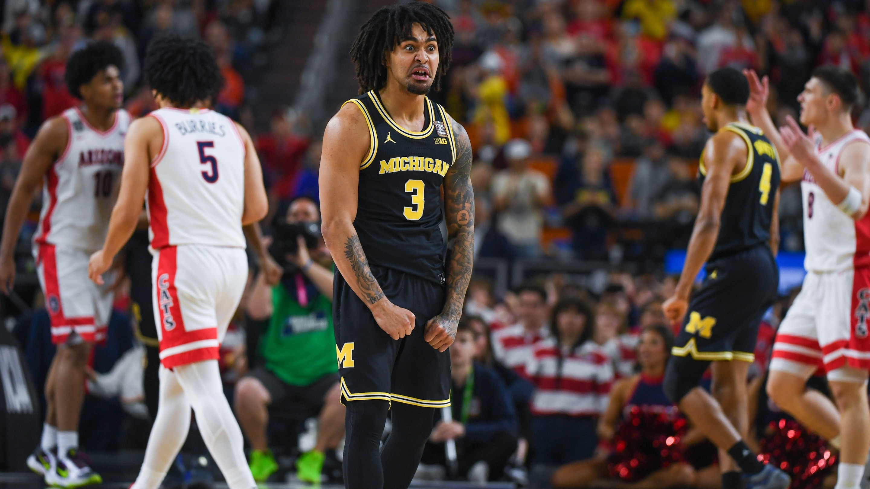 Elliot Cadeau #3 of the Michigan Wolverines reacts after a play during the first half of a NCAA Men's Basketball Tournament Final Four game against the Arizona Wildcats on April 4, 2026.