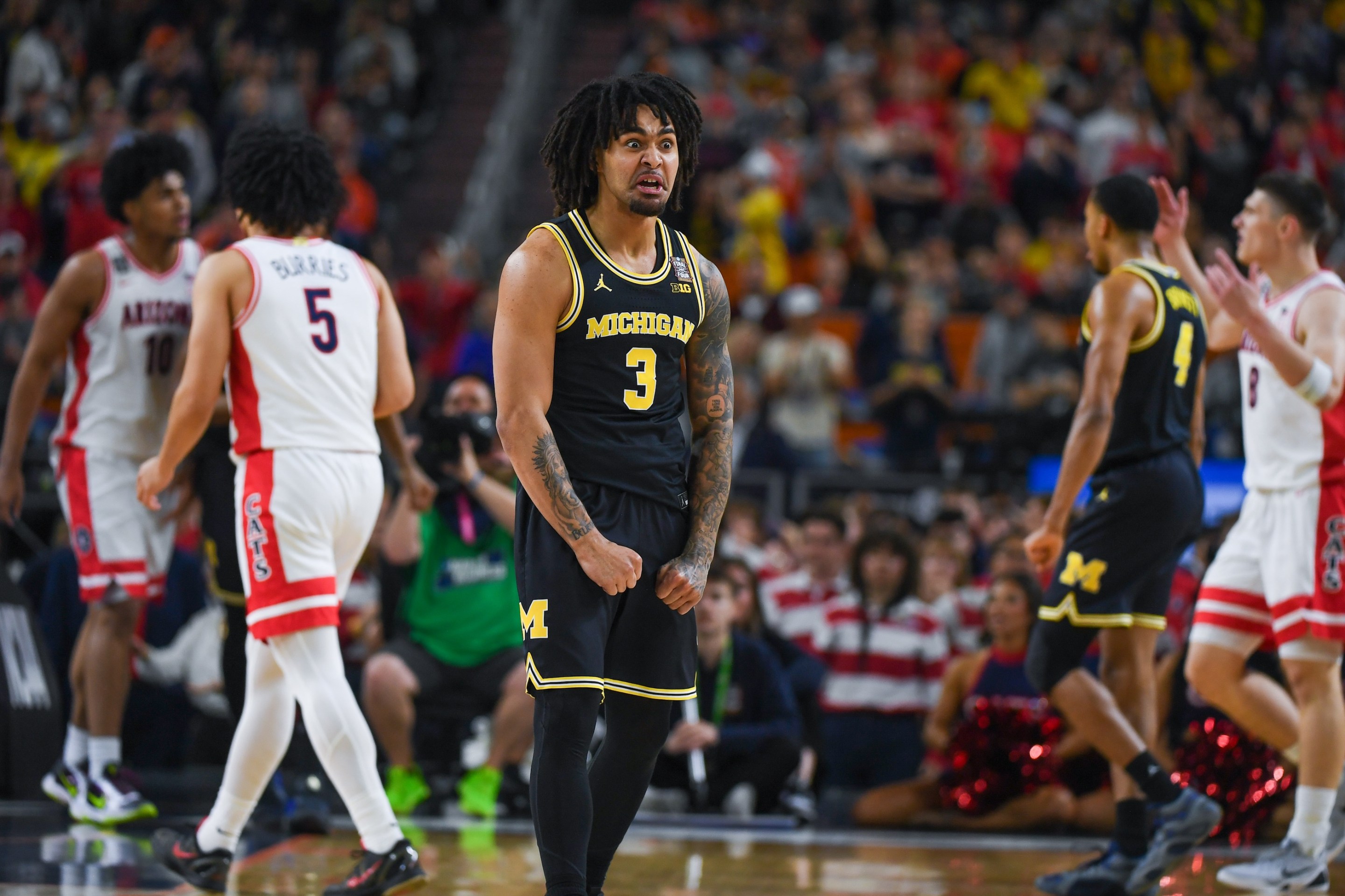 Elliot Cadeau #3 of the Michigan Wolverines reacts after a play during the first half of a NCAA Men's Basketball Tournament Final Four game against the Arizona Wildcats on April 4, 2026.