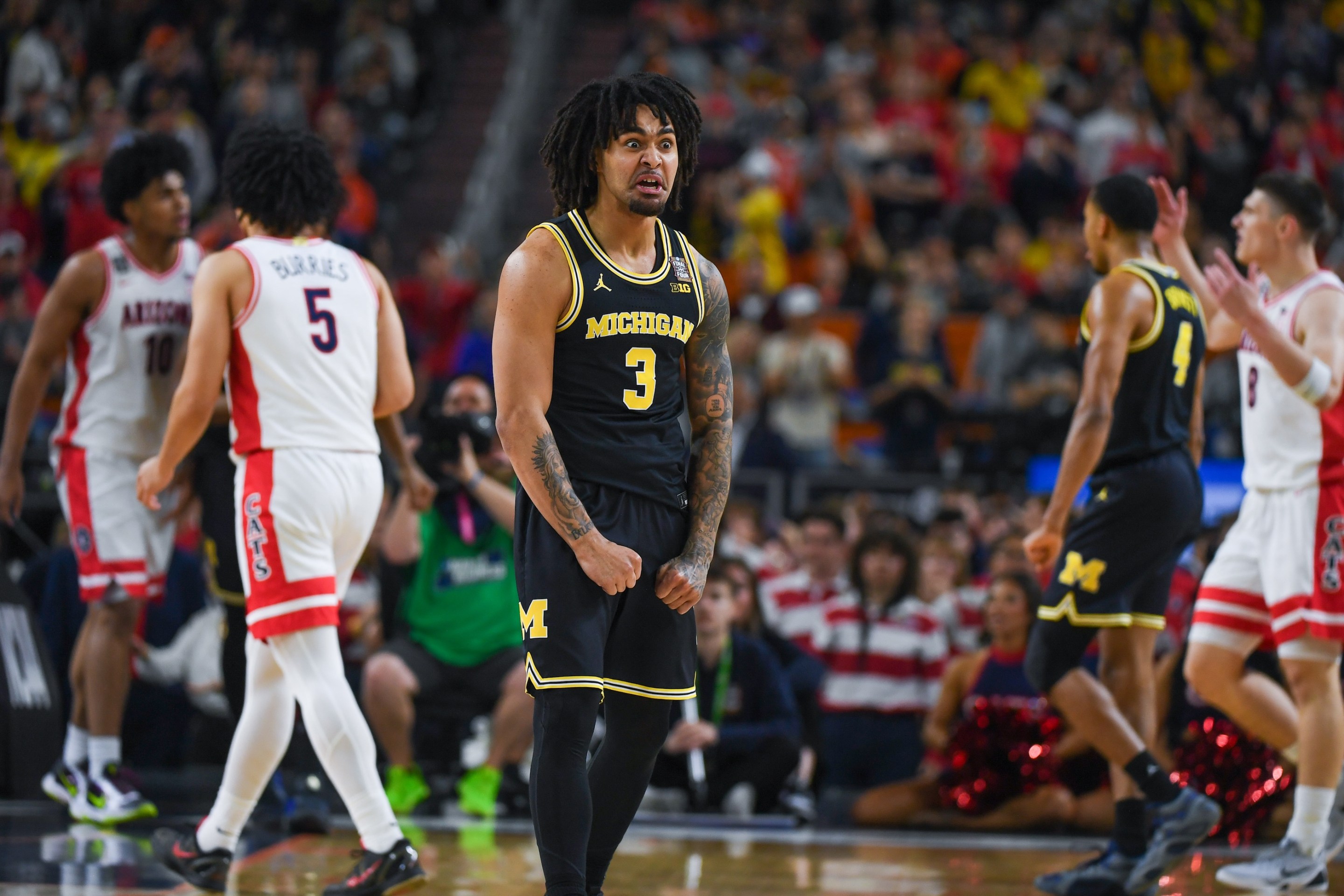 Elliot Cadeau #3 of the Michigan Wolverines reacts after a play during the first half of a NCAA Men's Basketball Tournament Final Four game against the Arizona Wildcats on April 4, 2026.