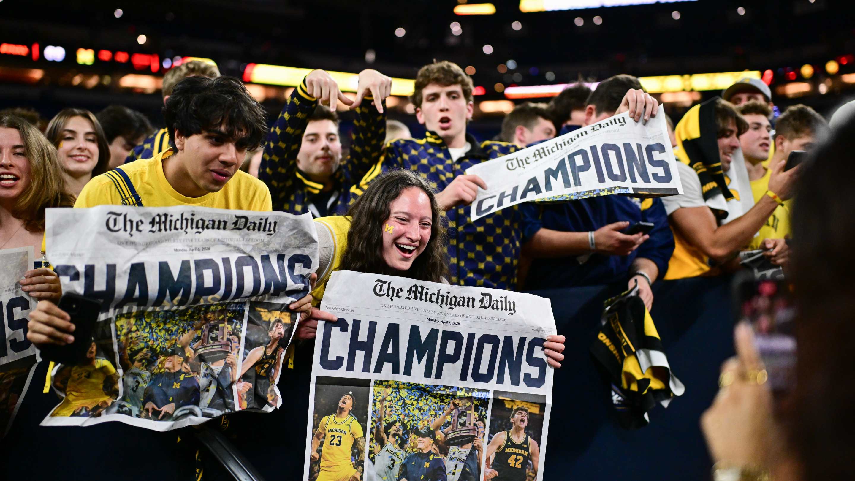 Fans of the Michigan Wolverines celebrate