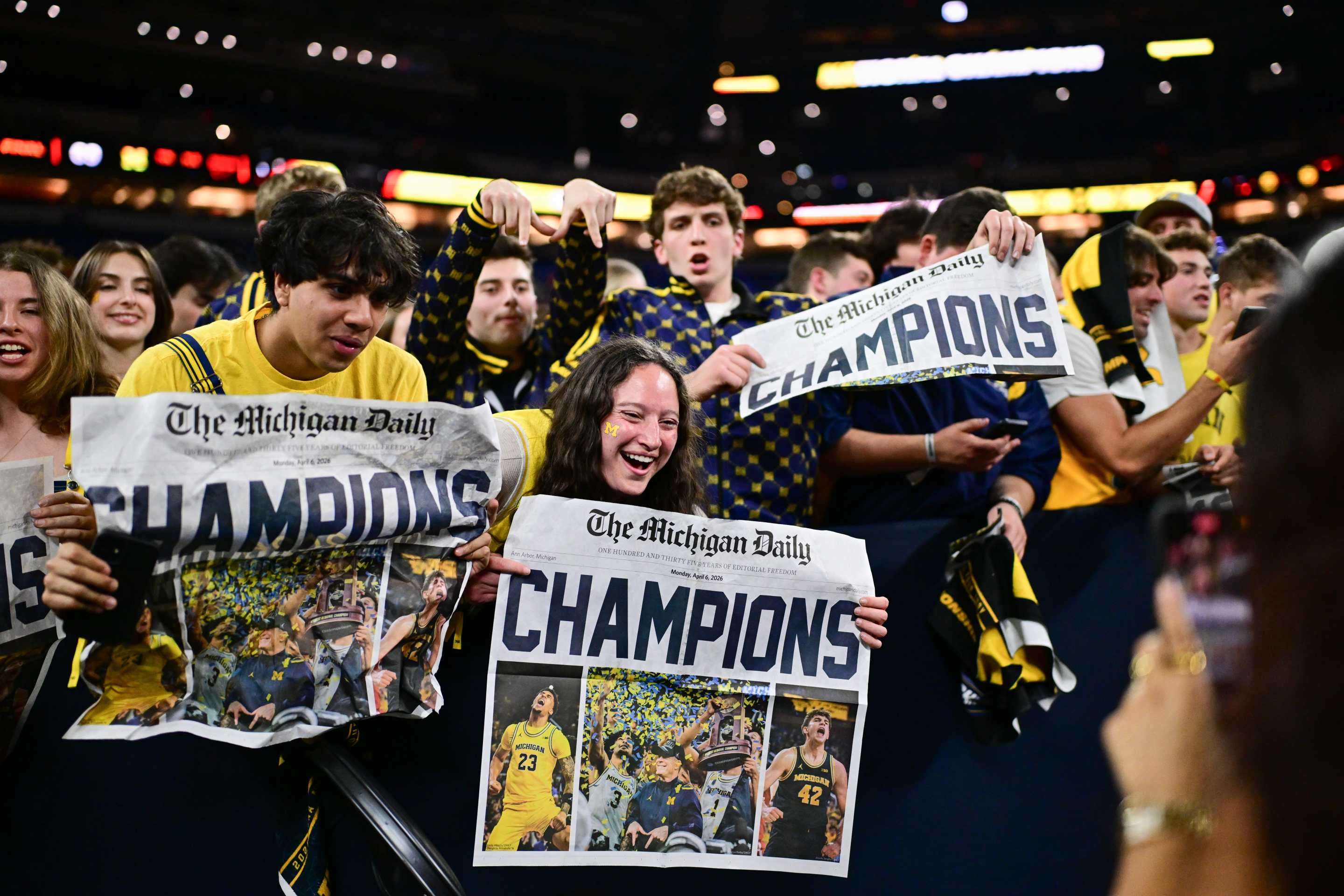 Fans of the Michigan Wolverines celebrate