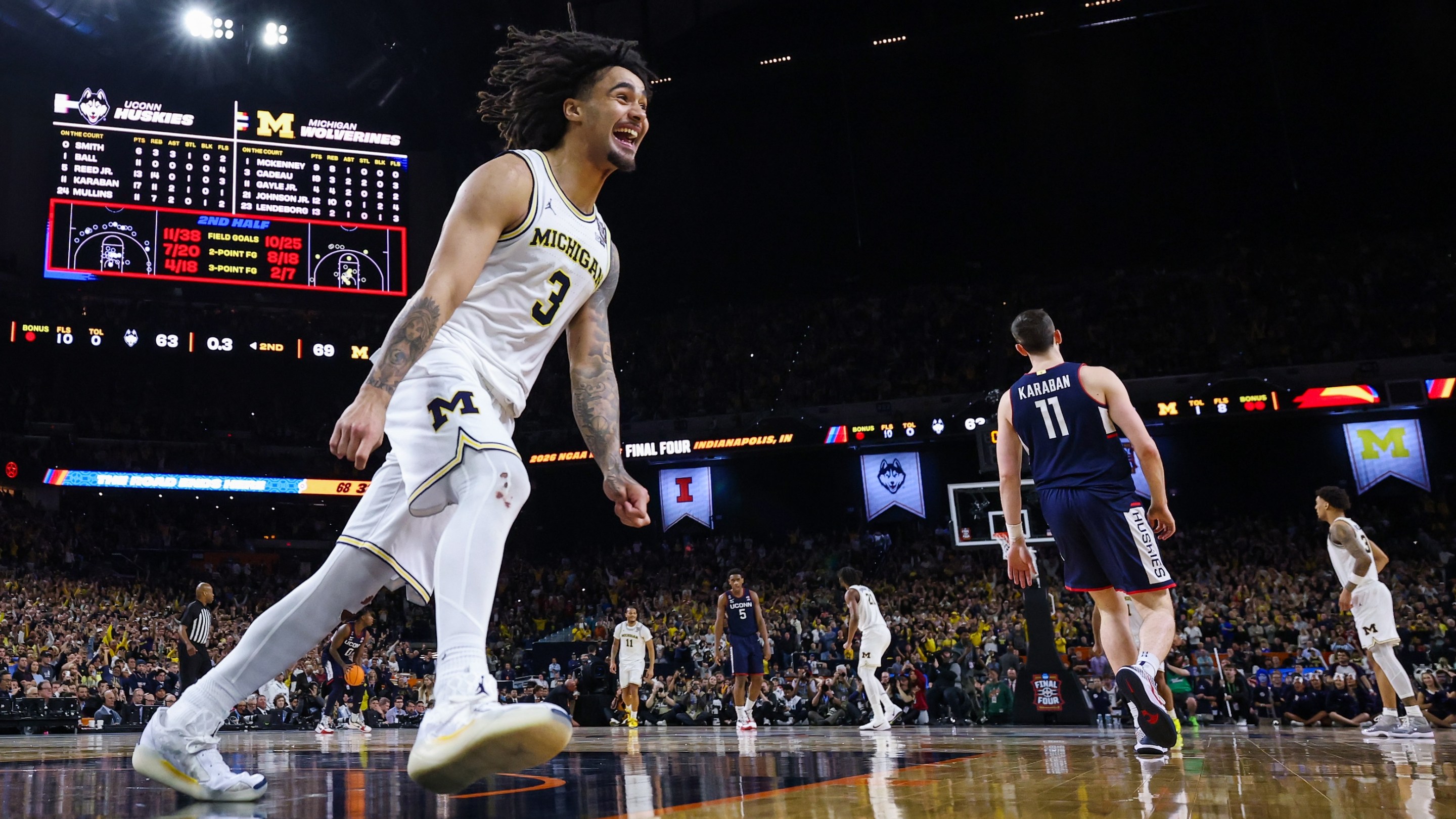 Elliot Cadeau #3 of the Michigan Wolverines celebrates after defeating the UConn Huskies 69-63 in the National Championship of the 2026 NCAA Men's Basketball Tournament on April 6, 2026.