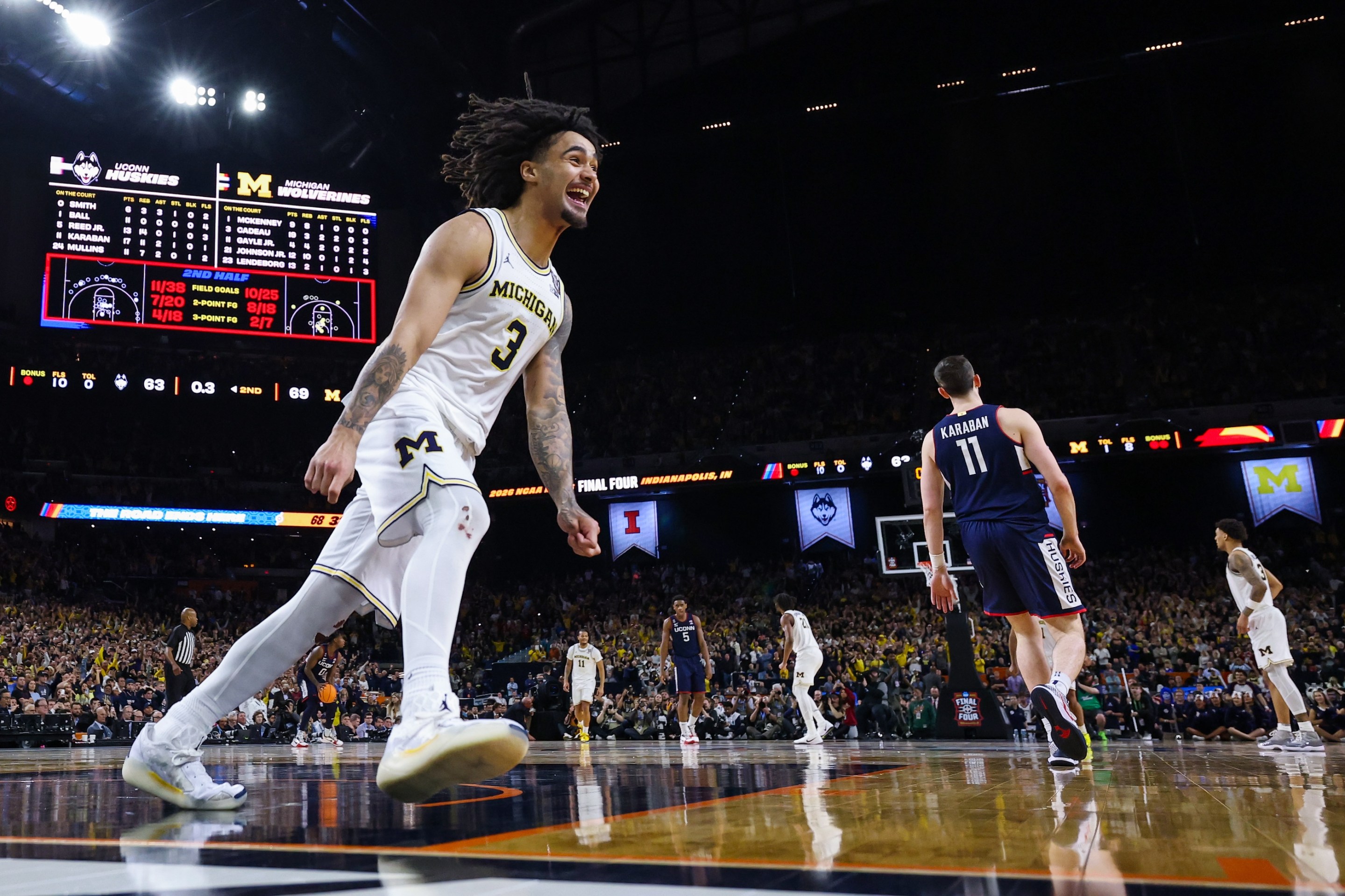 Elliot Cadeau #3 of the Michigan Wolverines celebrates after defeating the UConn Huskies 69-63 in the National Championship of the 2026 NCAA Men's Basketball Tournament on April 6, 2026.