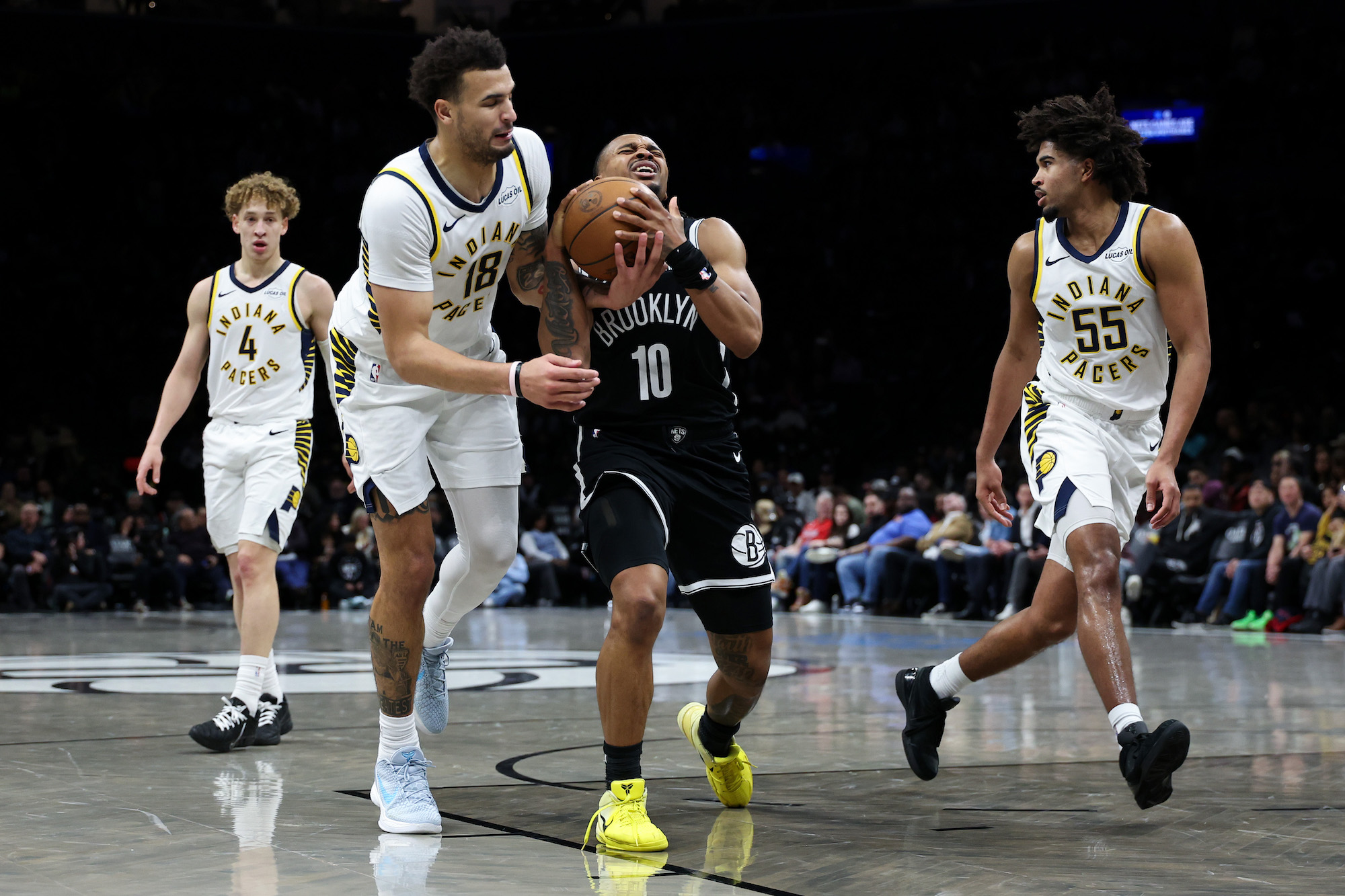 NEW YORK, NEW YORK - APRIL 09: Tyson Etienne #10 of the Brooklyn Nets and Jalen Slawson #18 of the Indiana Pacers battle for possession during the second half at Barclays Center on April 09, 2026 in New York City. NOTE TO USER: User expressly acknowledges and agrees that, by downloading and or using this photograph, User is consenting to the terms and conditions of the Getty Images License Agreement. (Photo by Jordan Bank/Getty Images)