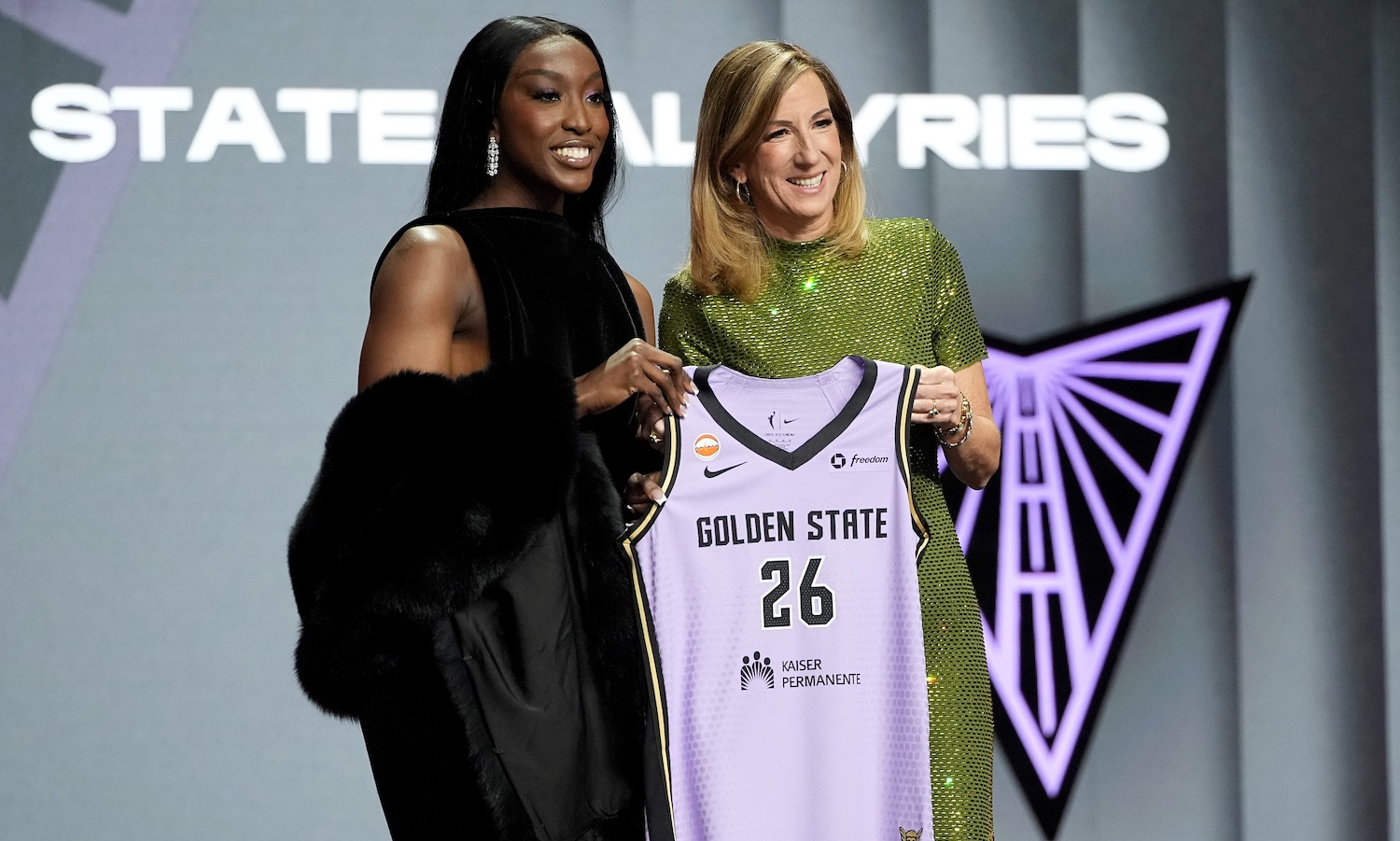 NEW YORK, NEW YORK - APRIL 13: Flau'jae Johnson (L) of LSU poses with WNBA Commissioner Cathy Engelbert (R) after being selected with the 8th pick in the first round by the Golden State Valkyries during the 2026 WNBA Draft at The Shed on April 13, 2026 in New York City. NOTE TO USER: User expressly acknowledges and agrees that, by downloading and or using this photograph, User is consenting to the terms and conditions of the Getty Images License Agreement. (Photo by Angelina Katsanis/Getty Images)