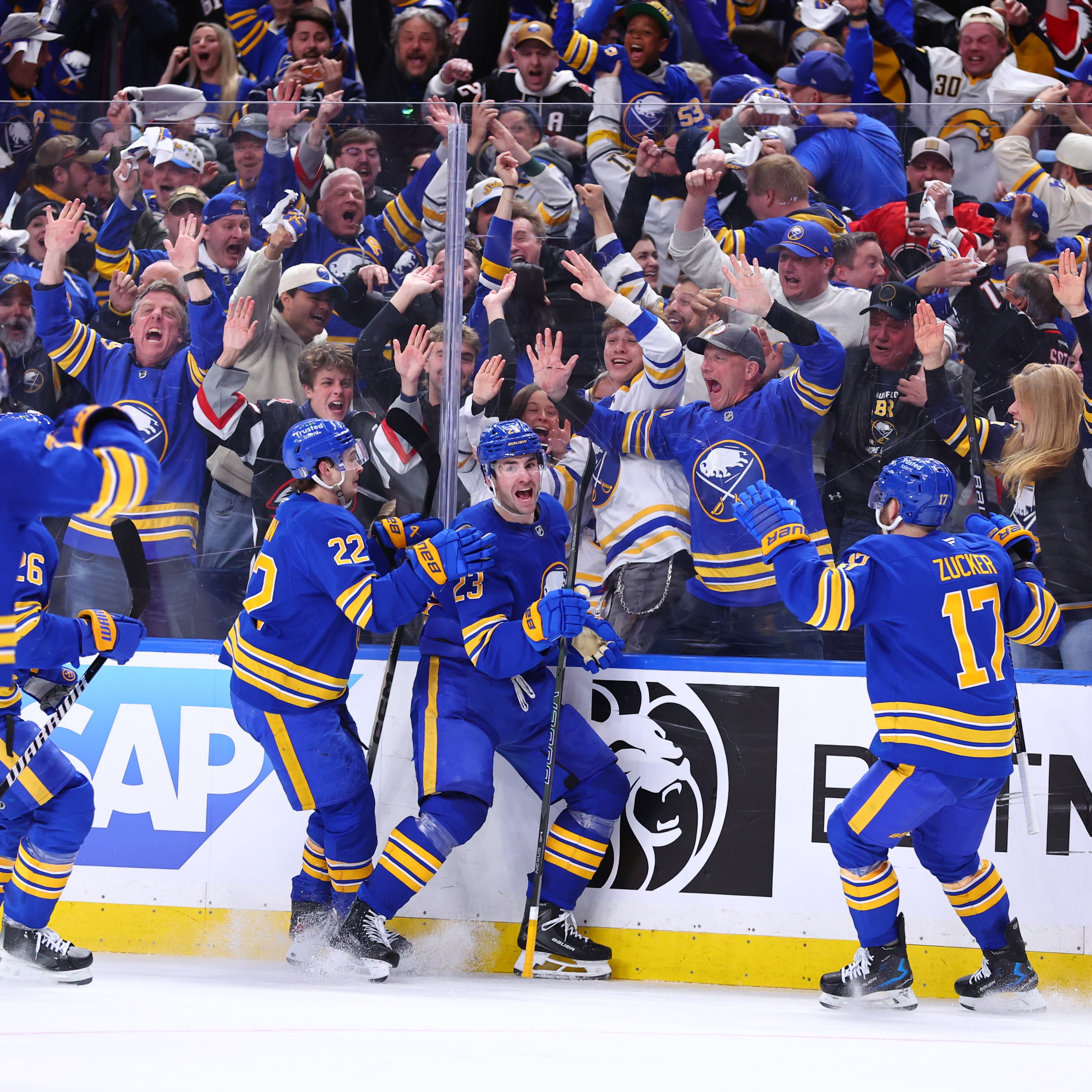 BUFFALO, NEW YORK - APRIL 19: Mattias Samuelsson #23 of the Buffalo Sabres celebrates his third period goal against the Boston Bruins with Jack Quinn #22 and Jason Zucker #17 in Game One of the First Round of the 2026 Stanley Cup Playoffs at KeyBank Center on April 19, 2026 in Buffalo, New York. (Photo by Bill Wippert/NHLI via Getty Images)