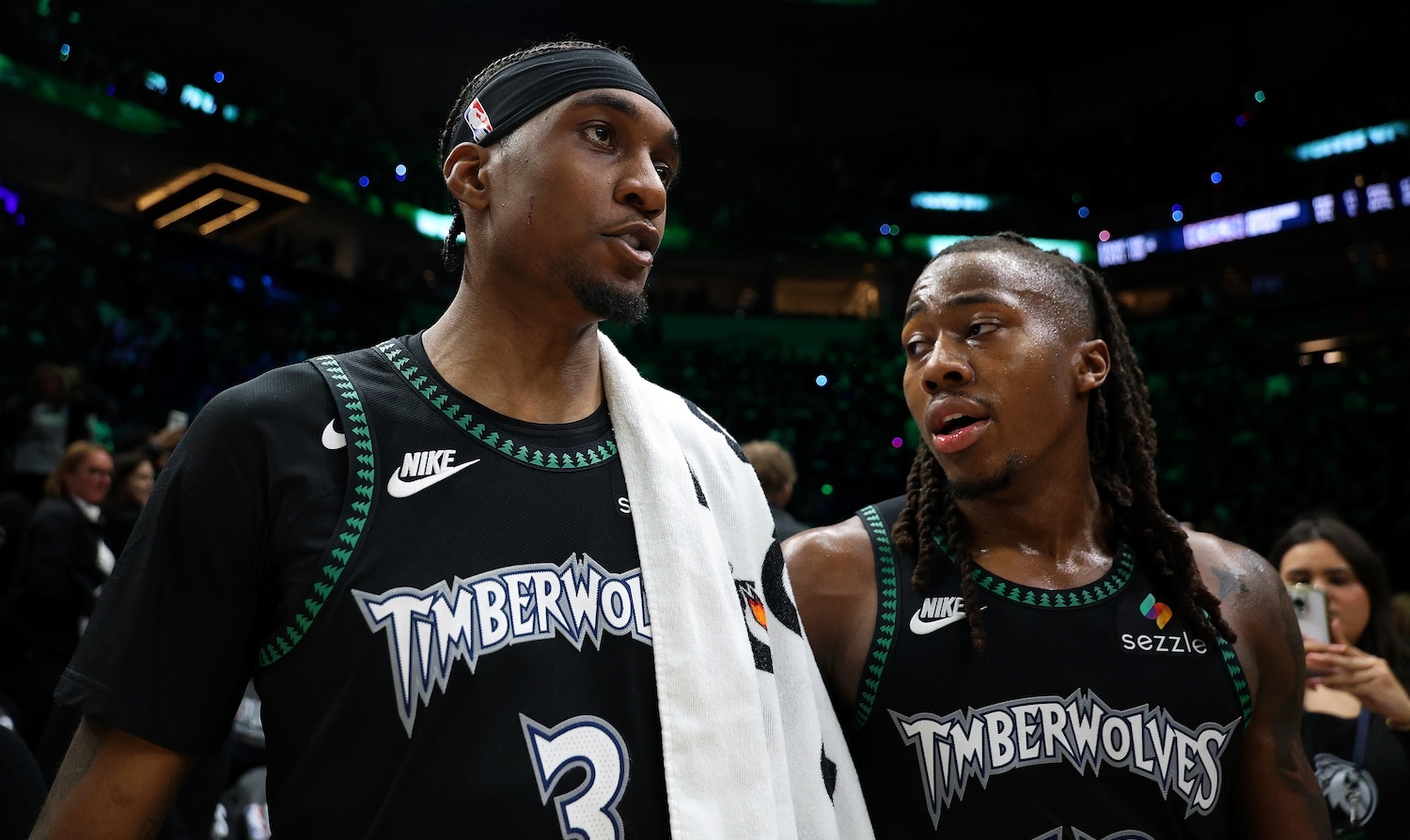 MINNEAPOLIS, MINNESOTA - APRIL 23: Jaden McDaniels #3 and Ayo Dosunmu #13 of the Minnesota Timberwolves look on after Game Three of the First Round of the 2026 NBA Western Conference Playoffs against the Denver Nuggets at Target Center on April 23, 2026 in Minneapolis, Minnesota. The Timberwolves defeated the Nuggets 113-96. NOTE TO USER: User expressly acknowledges and agrees that, by downloading and or using this photograph, User is consenting to the terms and conditions of the Getty Images License Agreement. (Photo by David Berding/Getty Images)