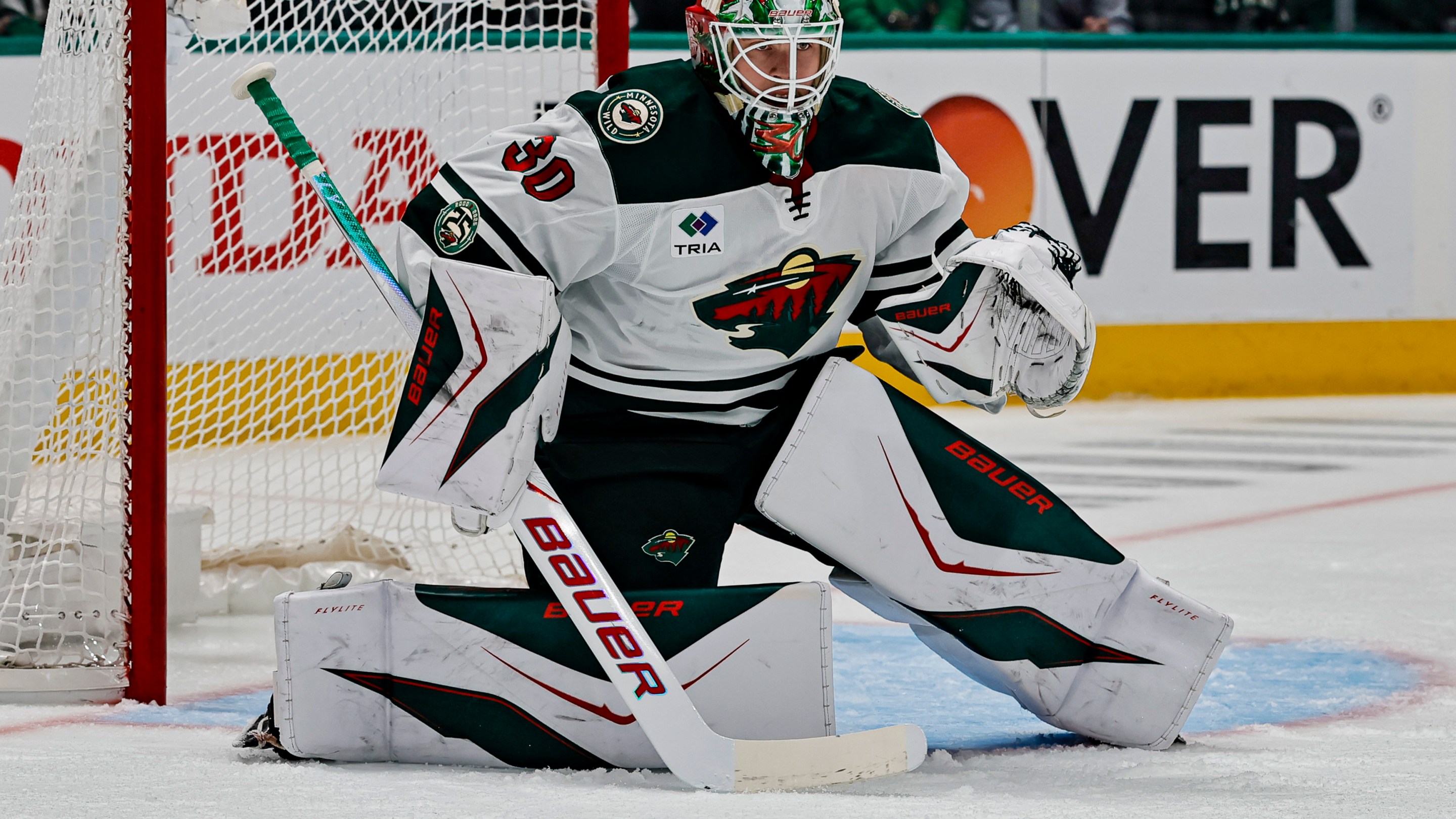 DALLAS, TX - APRIL 28: Minnesota Wild goaltender Jesper Wallstedt (30) blocks a shot during the Stanley Cup Playoffs First Round game 5 between the Dallas Stars and the Minnesota Wild on April 28, 2026 at American Airlines Center in Dallas, TX. (Photo by Matthew Pearce/Icon Sportswire via Getty Images)