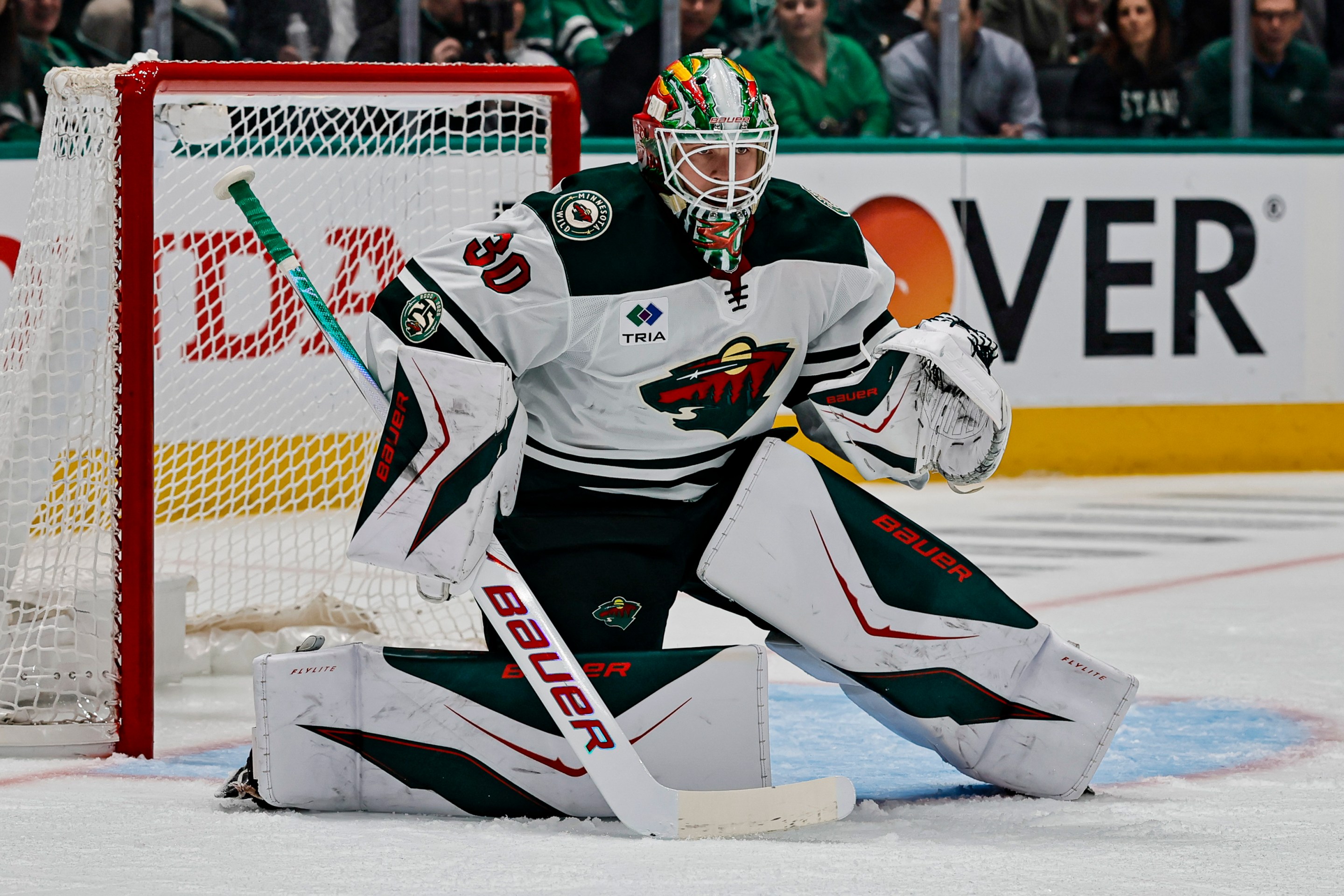 DALLAS, TX - APRIL 28: Minnesota Wild goaltender Jesper Wallstedt (30) blocks a shot during the Stanley Cup Playoffs First Round game 5 between the Dallas Stars and the Minnesota Wild on April 28, 2026 at American Airlines Center in Dallas, TX. (Photo by Matthew Pearce/Icon Sportswire via Getty Images)