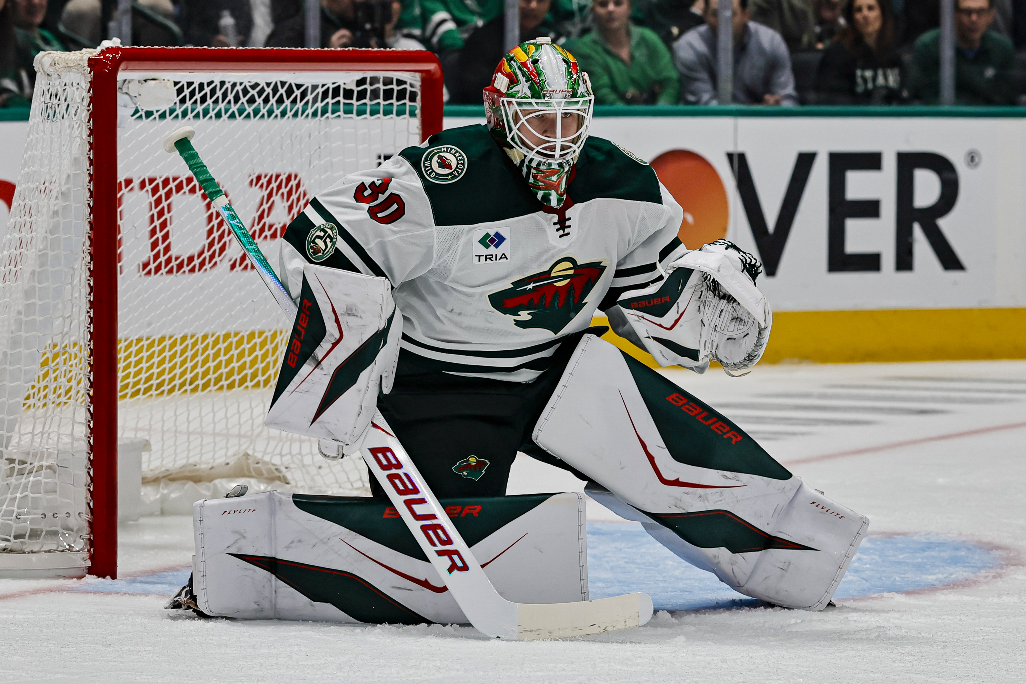 DALLAS, TX - APRIL 28: Minnesota Wild goaltender Jesper Wallstedt (30) blocks a shot during the Stanley Cup Playoffs First Round game 5 between the Dallas Stars and the Minnesota Wild on April 28, 2026 at American Airlines Center in Dallas, TX. (Photo by Matthew Pearce/Icon Sportswire via Getty Images)