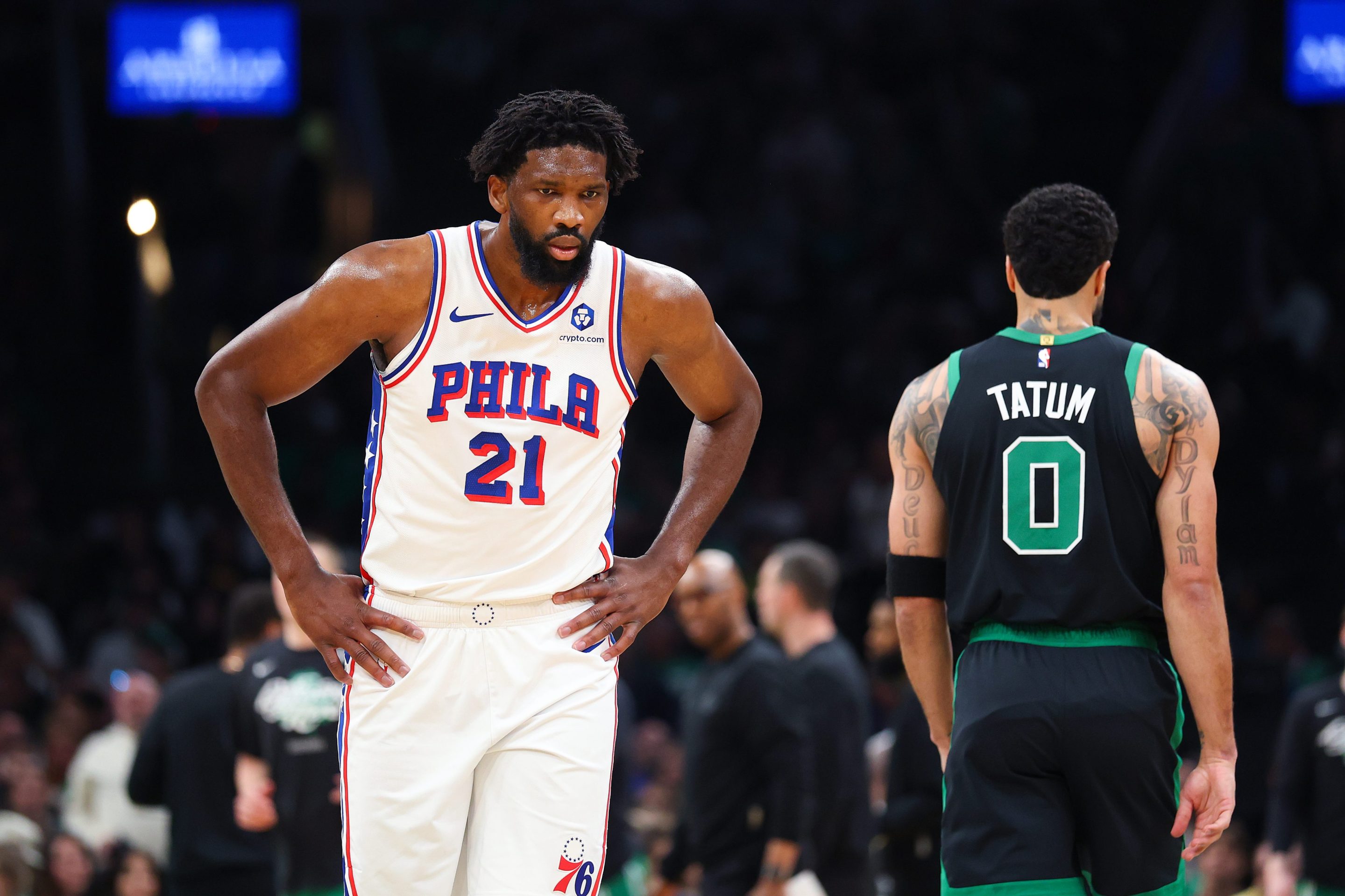 Joel Embiid #21 of the Philadelphia 76ers reacts against Jayson Tatum #0 of the Boston Celtics during the first quarter in Game Five