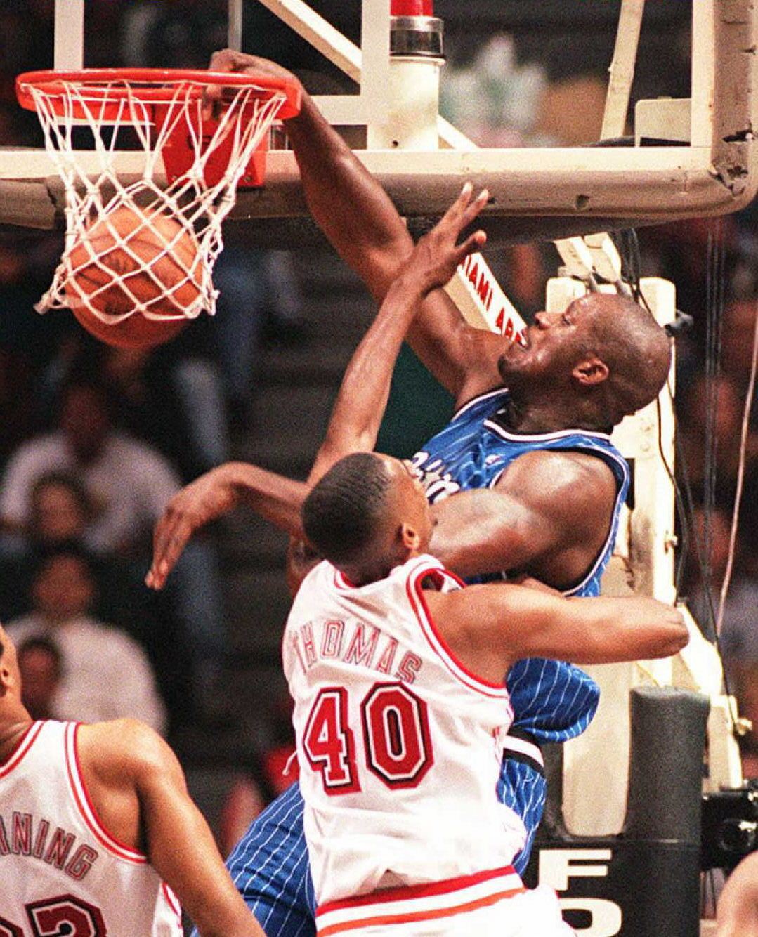 Shaq dunking on the Miami Heat