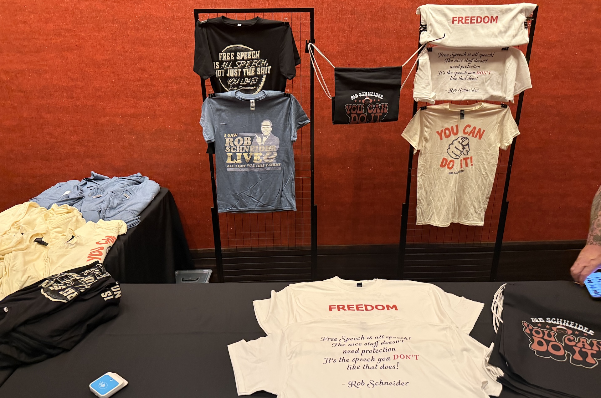 The merch table at the Rob Schneider comedy show