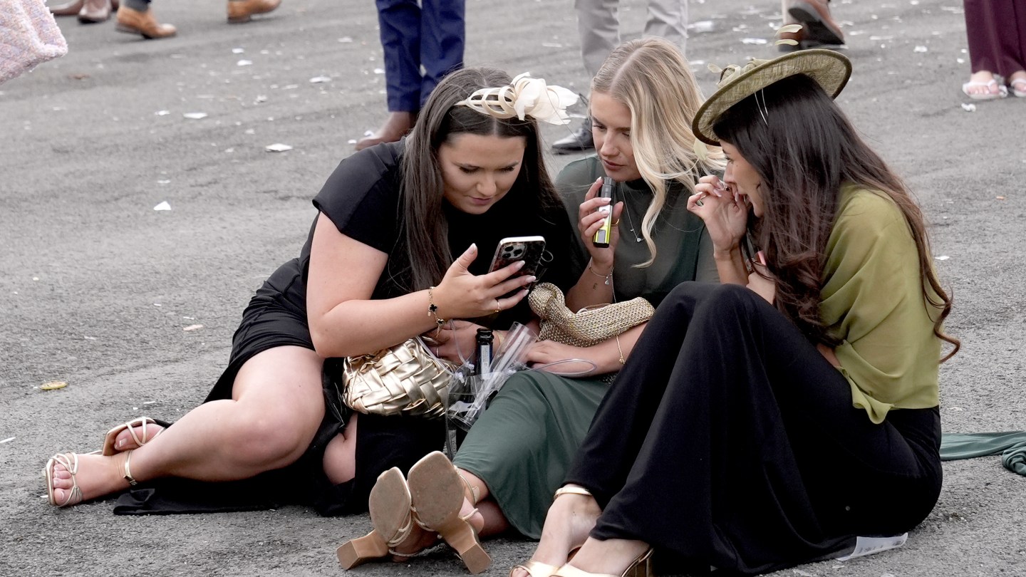 Racegoers on Ladies Day of the Randox Grand National Festival 2026 at Aintree Racecourse.