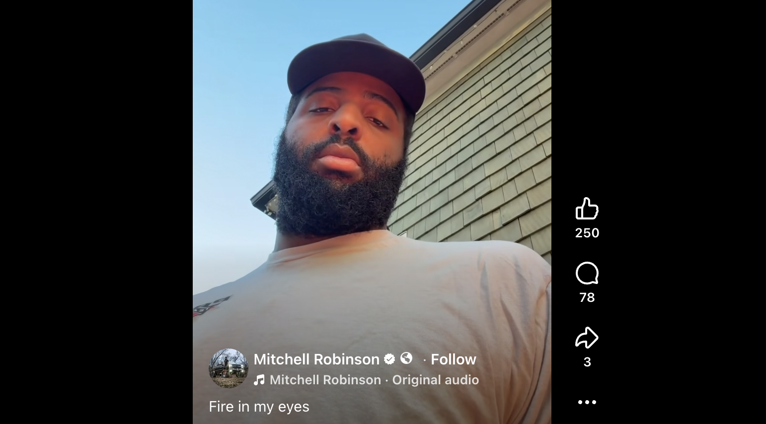 Mitchell Robinson staring at the camera, with the caption "Fire in my eyes"