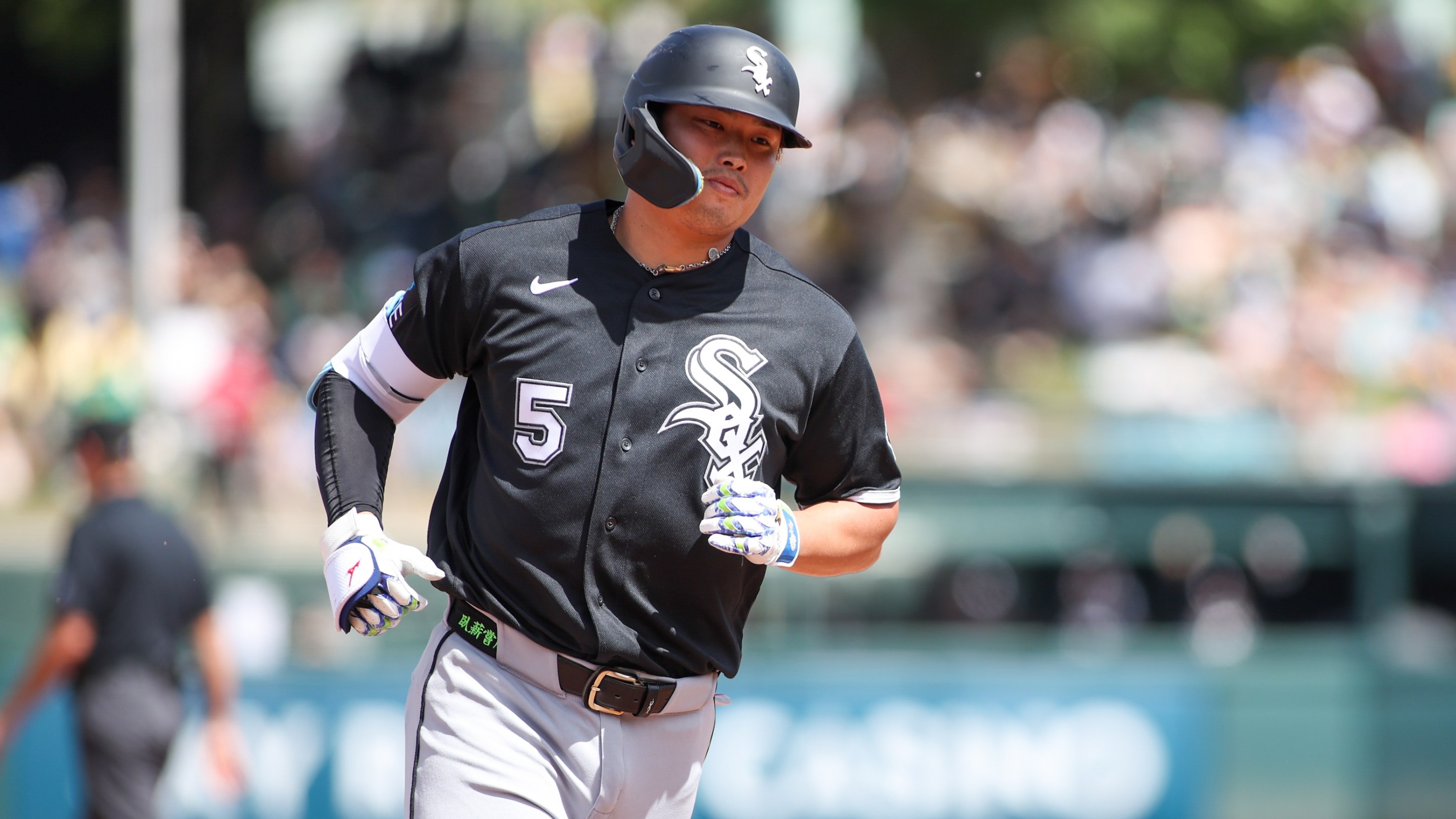 Munetaka Murakami #5 of the Chicago White Sox rounds the bases after hitting a two-run home run.