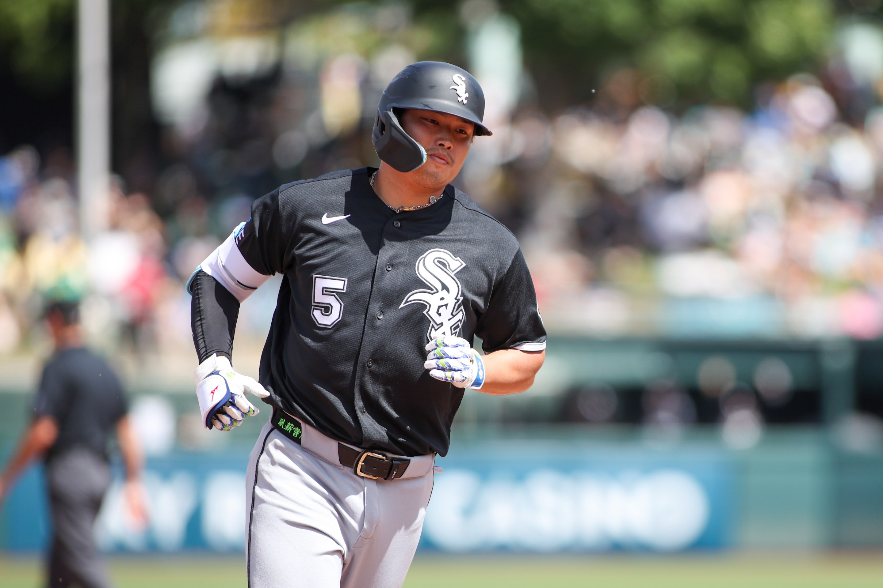 Munetaka Murakami #5 of the Chicago White Sox rounds the bases after hitting a two-run home run.