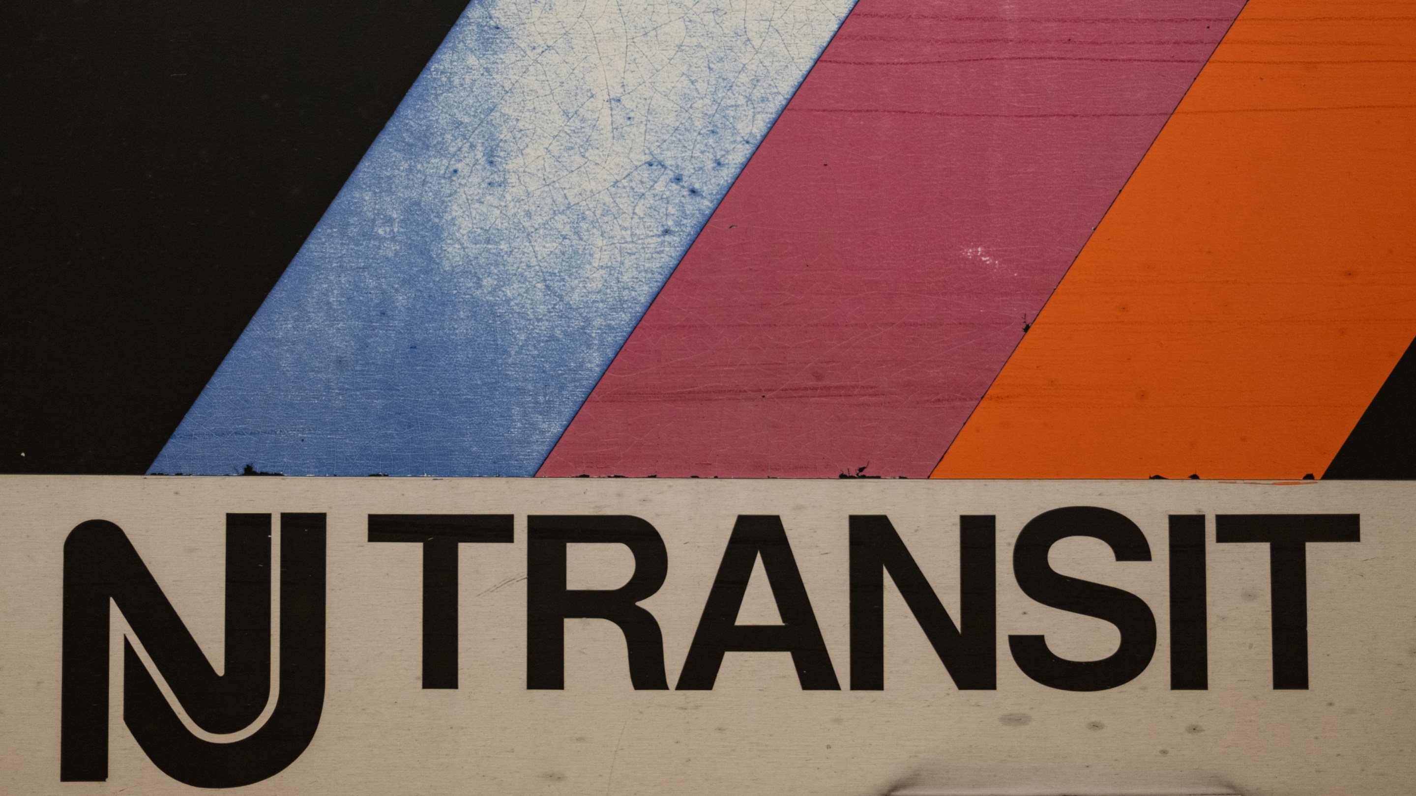 The NJ Transit logo is seen on a train at New York City Penn Station.