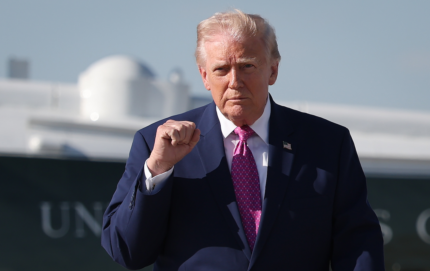 Donald Trump, making a fist