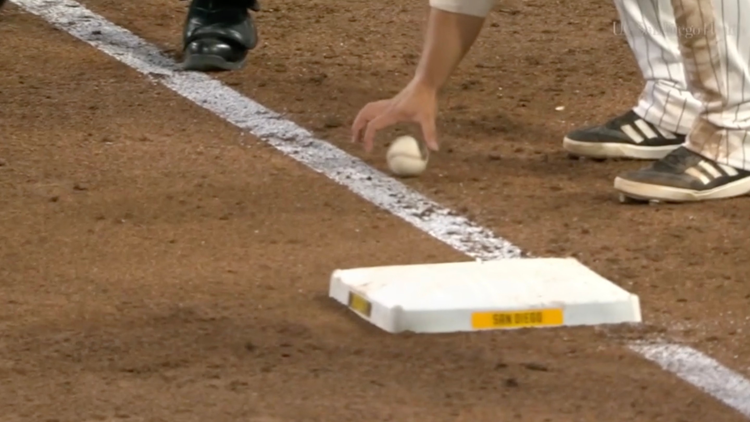 Ty France grabs a ball that is seemingly foul. But it's fair!