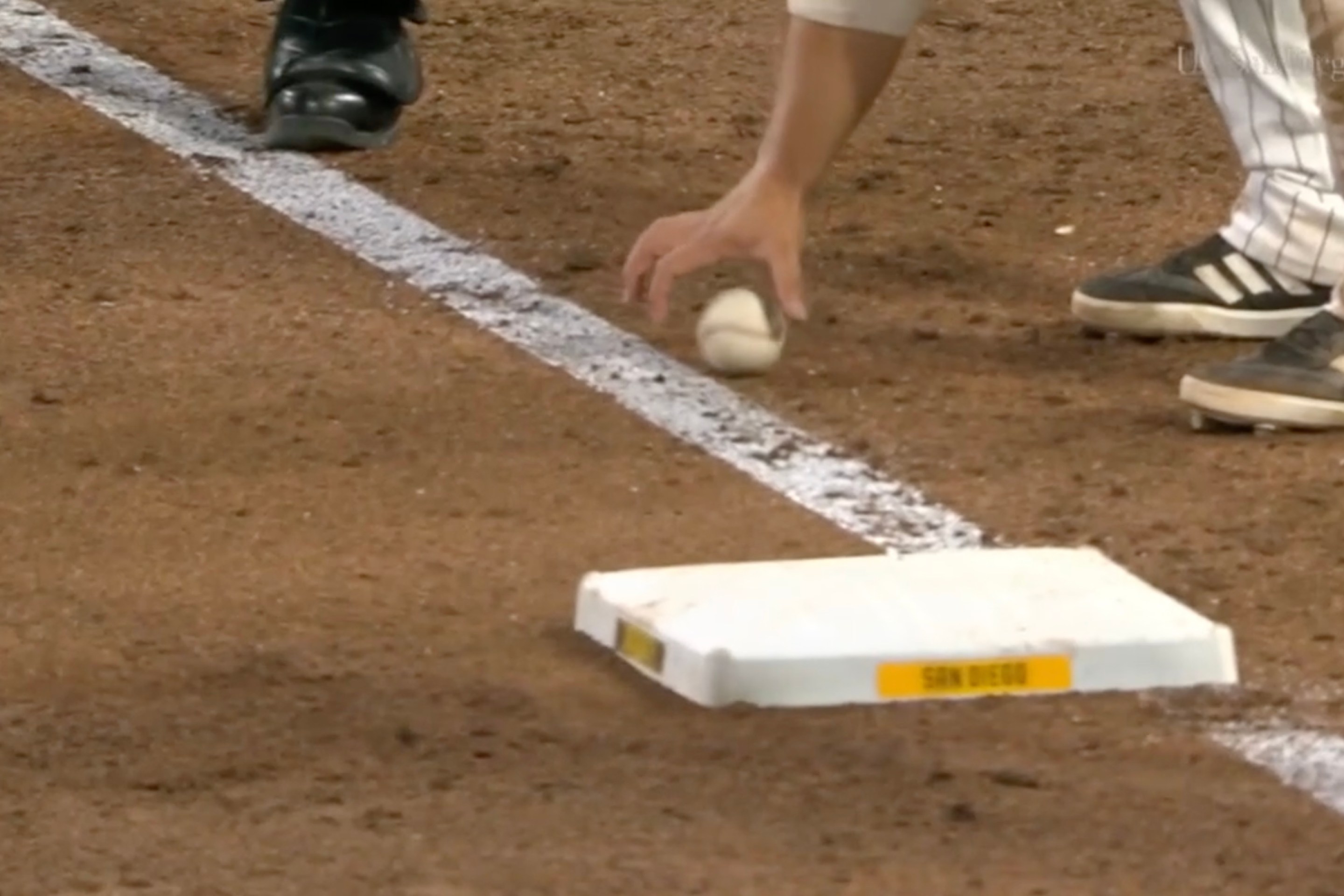 Ty France grabs a ball that is seemingly foul. But it's fair!