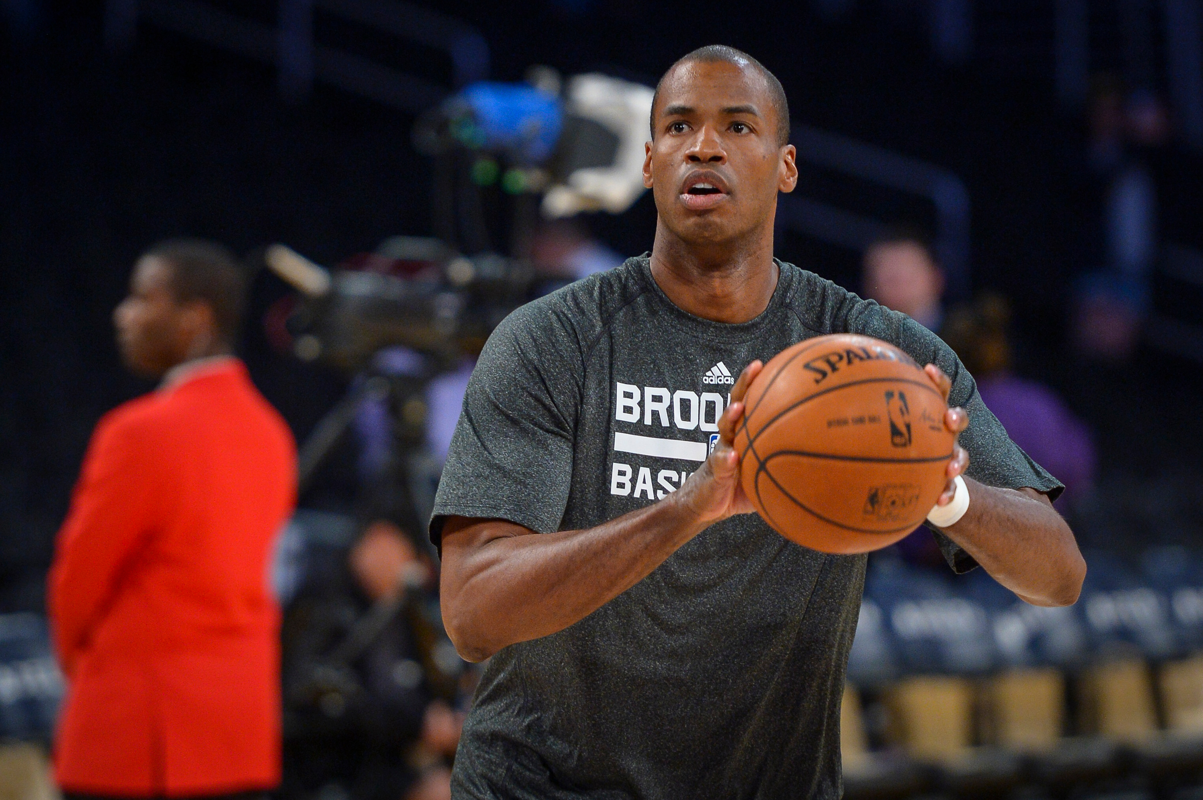 Jason Collins warms up for the Brooklyn Nets