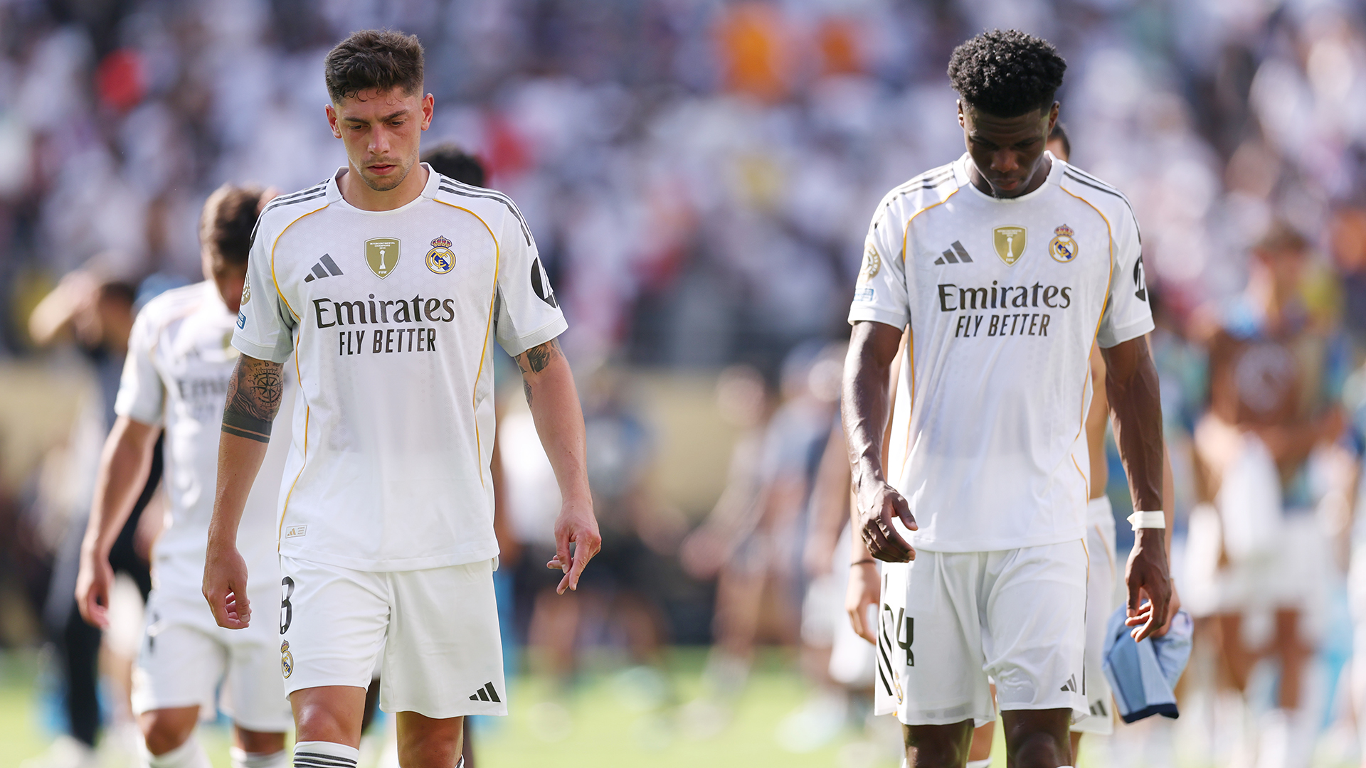 Federico Valverde #8 and Aurelien Tchouameni #14 of Real Madrid C.F. react following the FIFA Club World Cup 2025 semi-final match between Paris Saint-Germain and Real Madrid CF at MetLife Stadium on July 09, 2025 in East Rutherford, New Jersey.