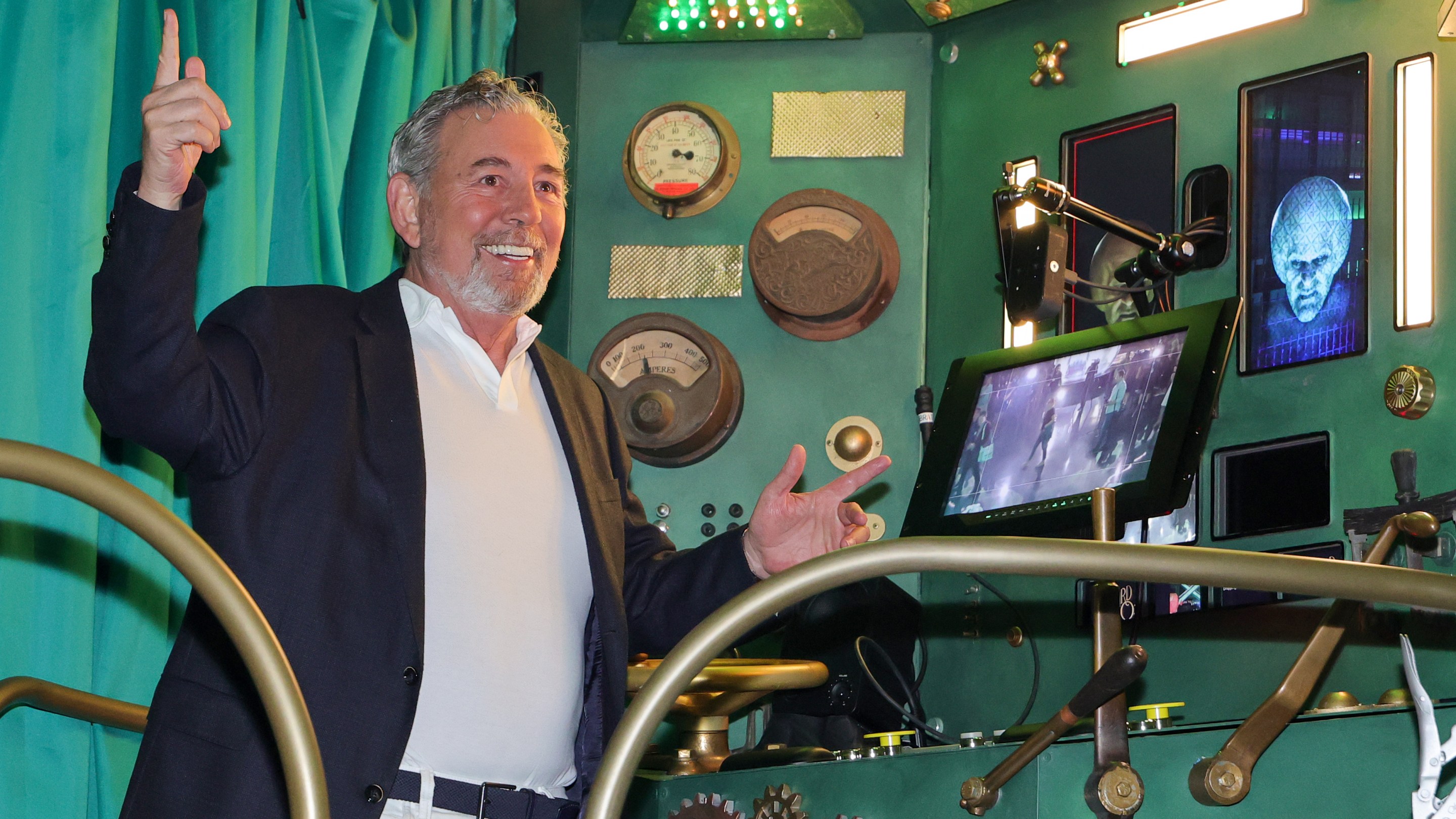 Sphere Entertainment Co. Executive Chairman and CEO James Dolan operates a booth for the Wizard's chamber during a preview of the Atrium experience for "The Wizard of Oz at Sphere" ahead of the show's premiere on August 28, 2025 in Las Vegas, Nevada. (Photo by Ethan Miller/Getty Images)