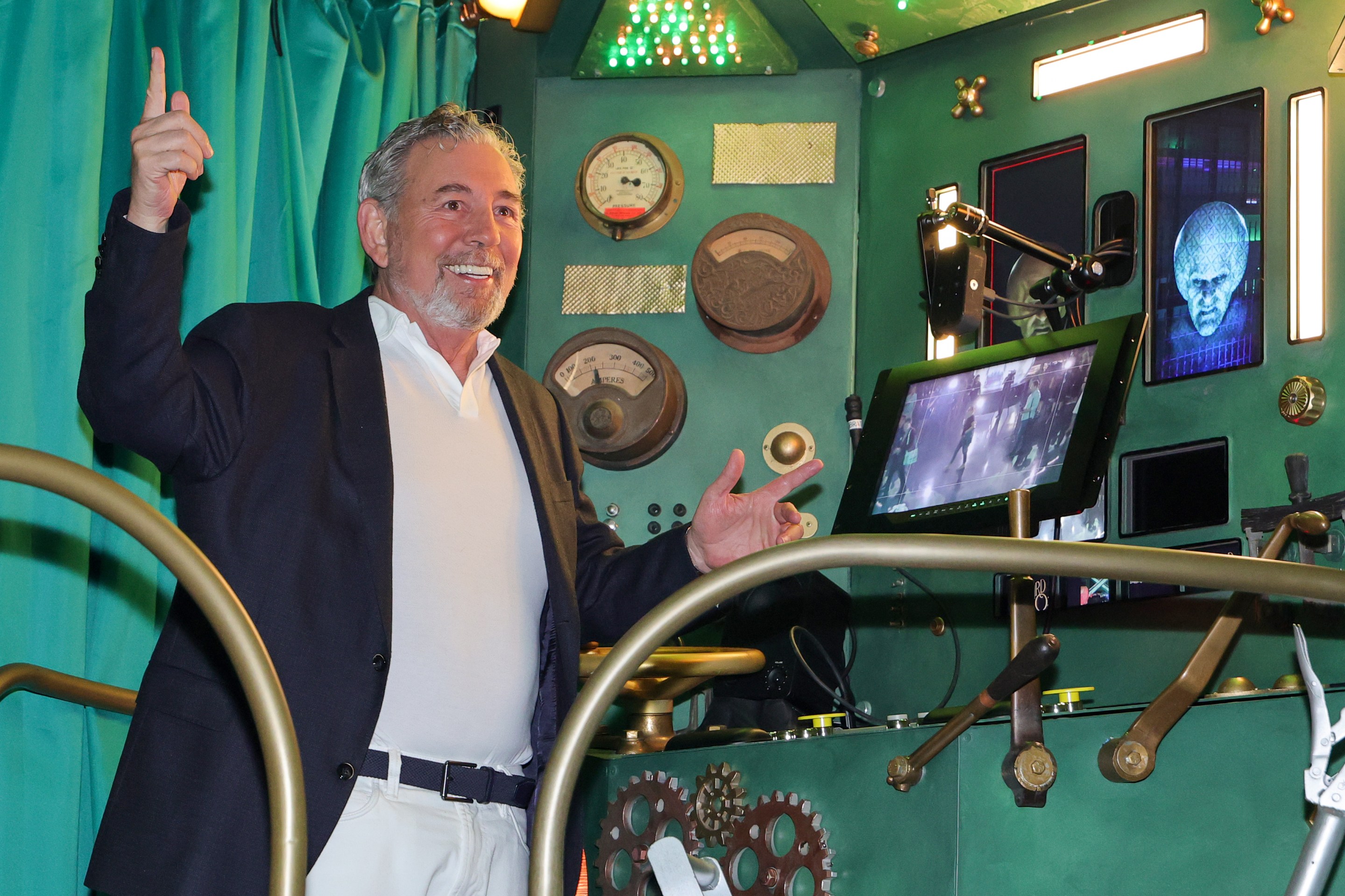 Sphere Entertainment Co. Executive Chairman and CEO James Dolan operates a booth for the Wizard's chamber during a preview of the Atrium experience for "The Wizard of Oz at Sphere" ahead of the show's premiere on August 28, 2025 in Las Vegas, Nevada. (Photo by Ethan Miller/Getty Images)