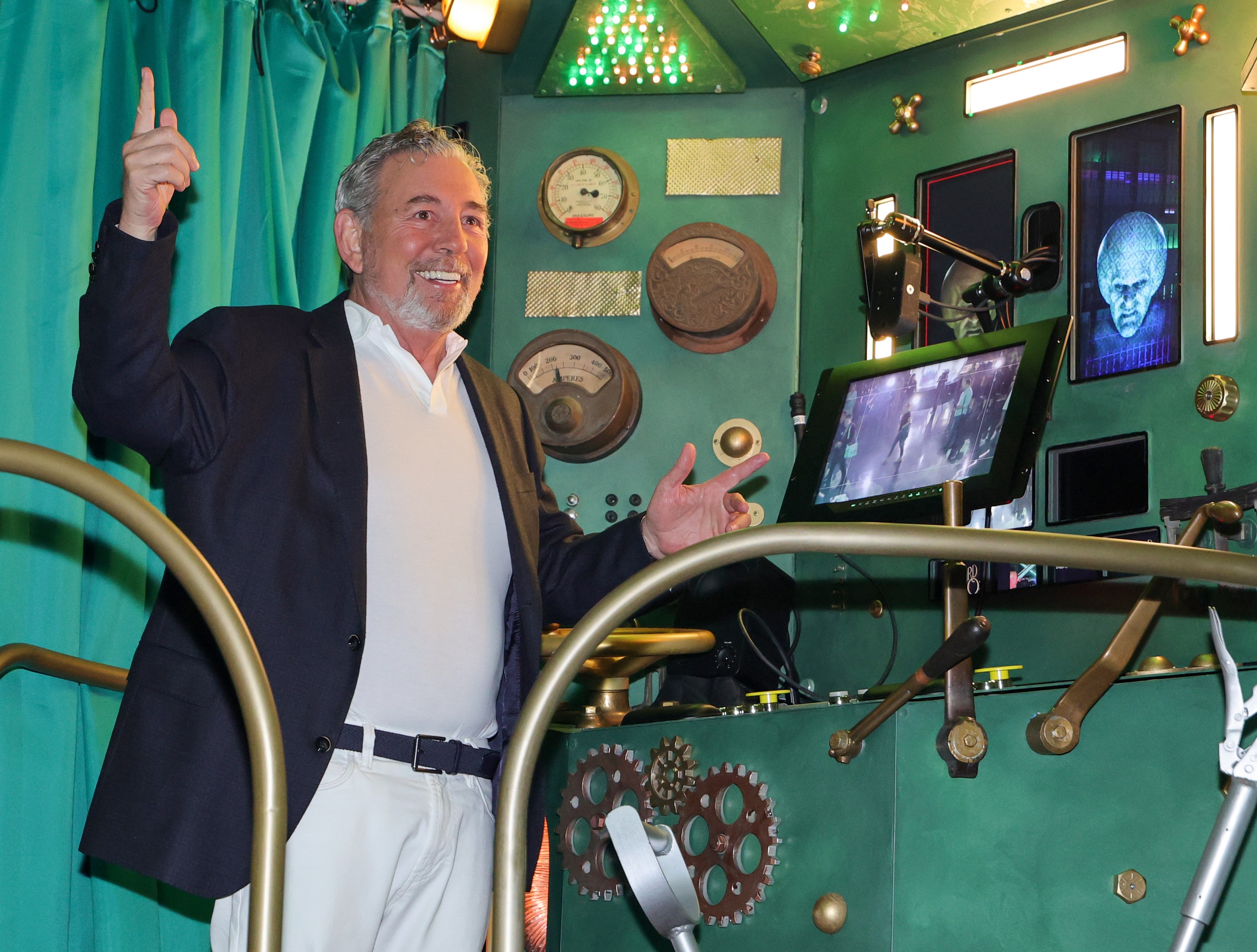 Sphere Entertainment Co. Executive Chairman and CEO James Dolan operates a booth for the Wizard's chamber during a preview of the Atrium experience for "The Wizard of Oz at Sphere" ahead of the show's premiere on August 28, 2025 in Las Vegas, Nevada. (Photo by Ethan Miller/Getty Images)