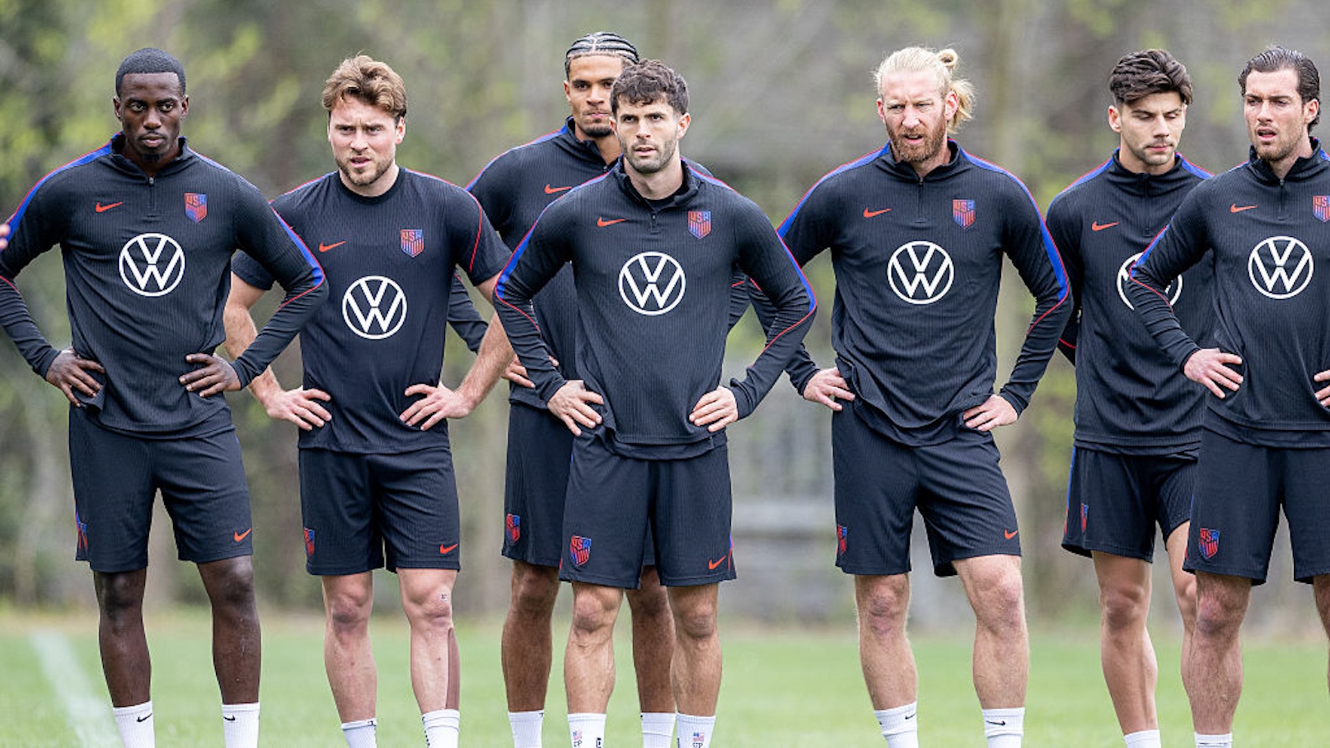 USMNT players stand in a row