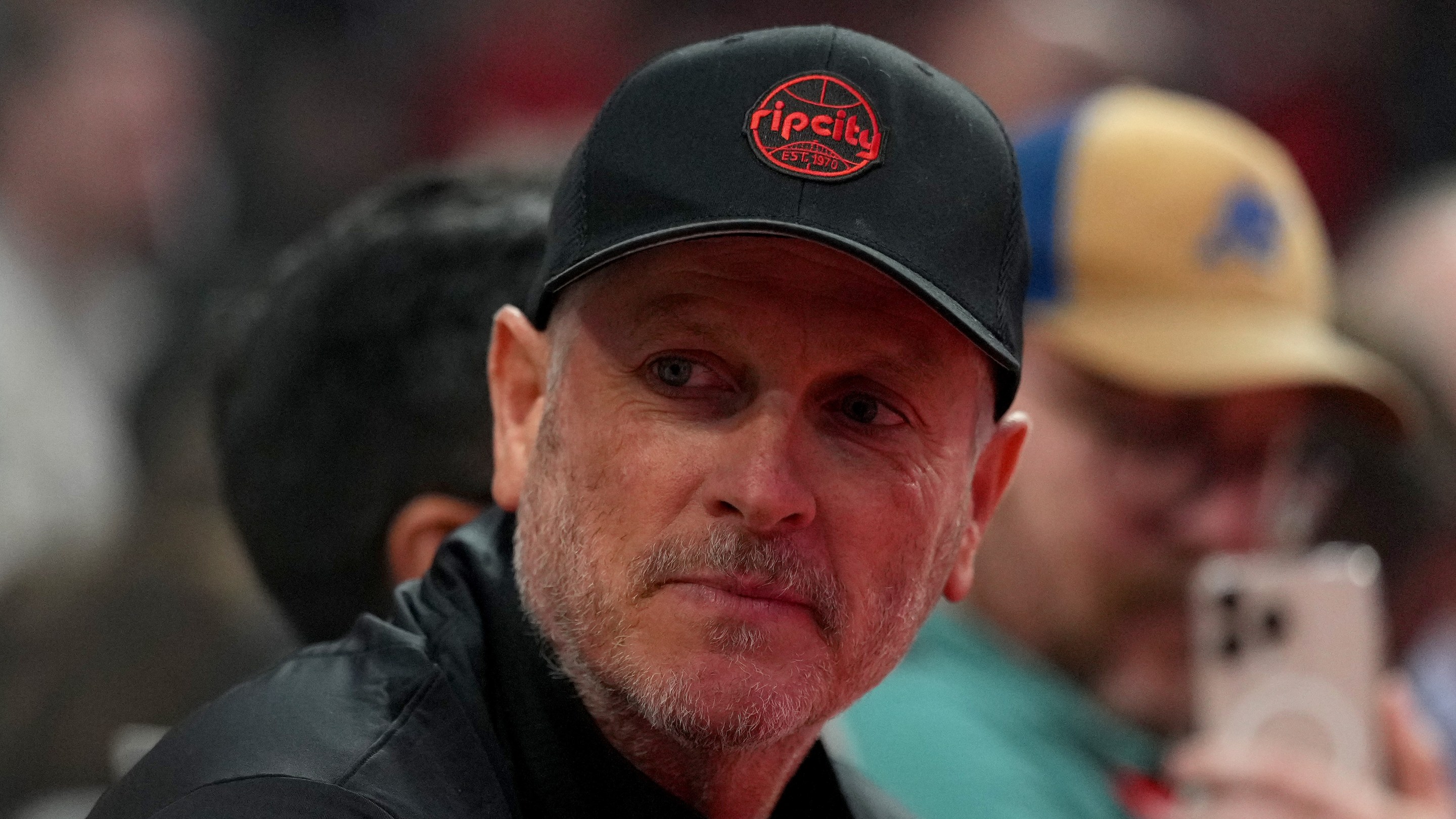 PORTLAND, OREGON - APRIL 24: Tom Dundon, Portland Trail Blazers owner, looks on before Game Three of the Western Conference First Round Playoffs against the San Antonio Spurs at Moda Center on April 24, 2026 in Portland, Oregon. NOTE TO USER: User expressly acknowledges and agrees that, by downloading and or using this photograph, User is consenting to the terms and conditions of the Getty Images License Agreement. (Photo by Soobum Im/Getty Images)