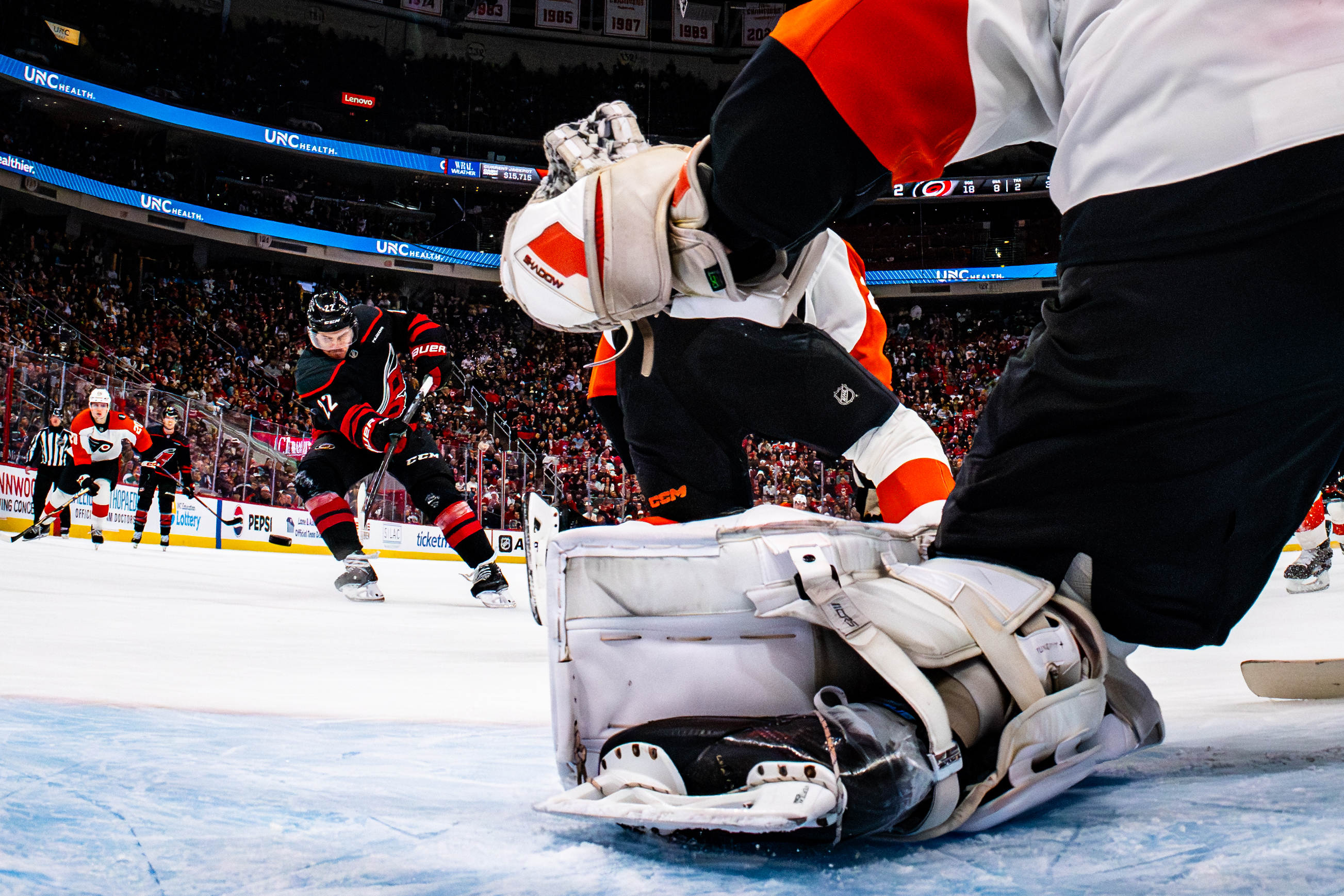 Logan Stankoven #22 of the Carolina Hurricanes shoots the puck for a goal against goalie Dan Vladar #80 of the Philadelphia Flyers in Game One of the Second Round of the 2026 Stanley Cup Playoffs.