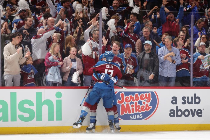 Nazem Kadri #91 and Parker Kelly #17 of the Colorado Avalanche celebrate after a goal